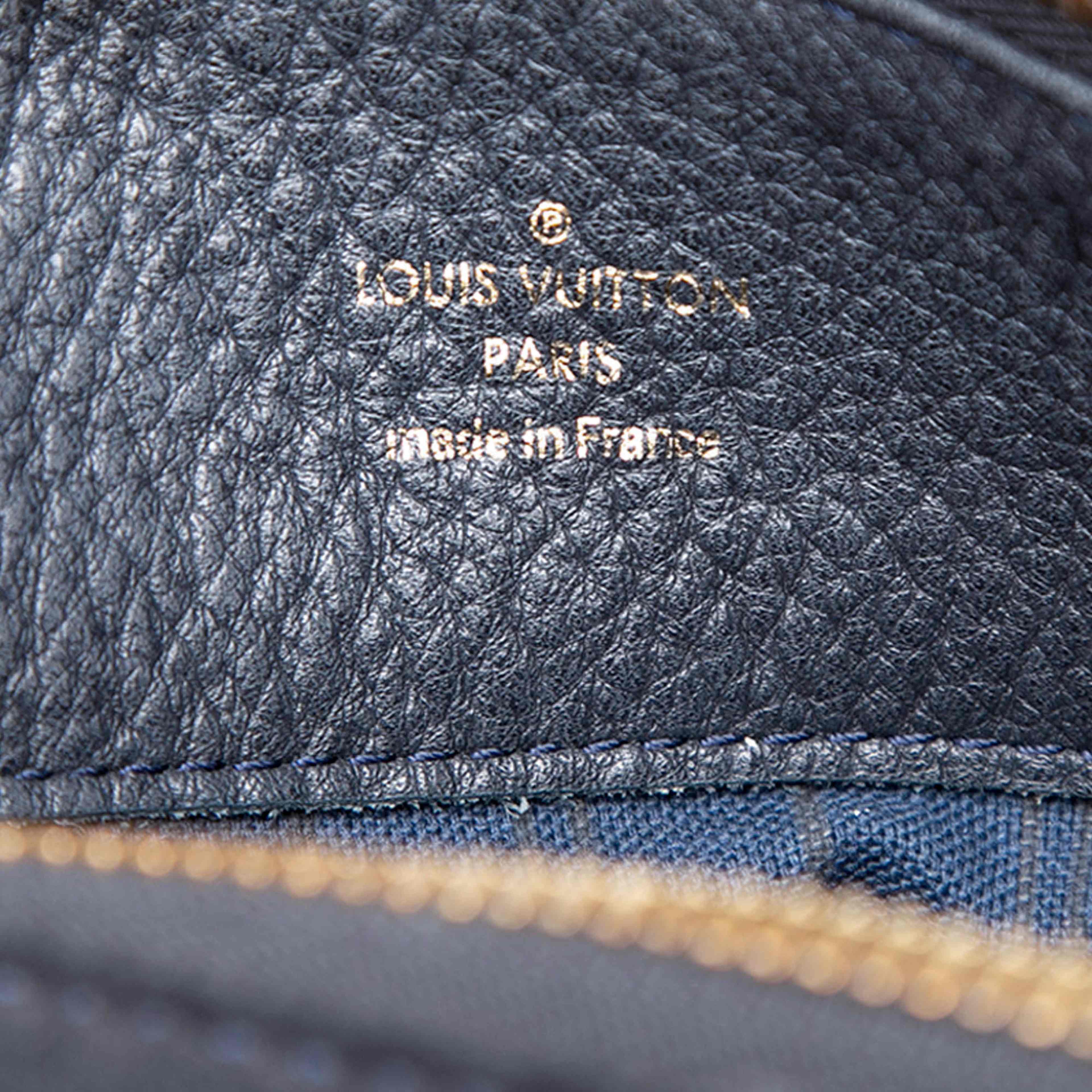 Louis Vuitton Monogram Empreinte Audacieuse Mm, från Luxclusif, i färgen navy. Klicka för att öppna bilden i stort format
