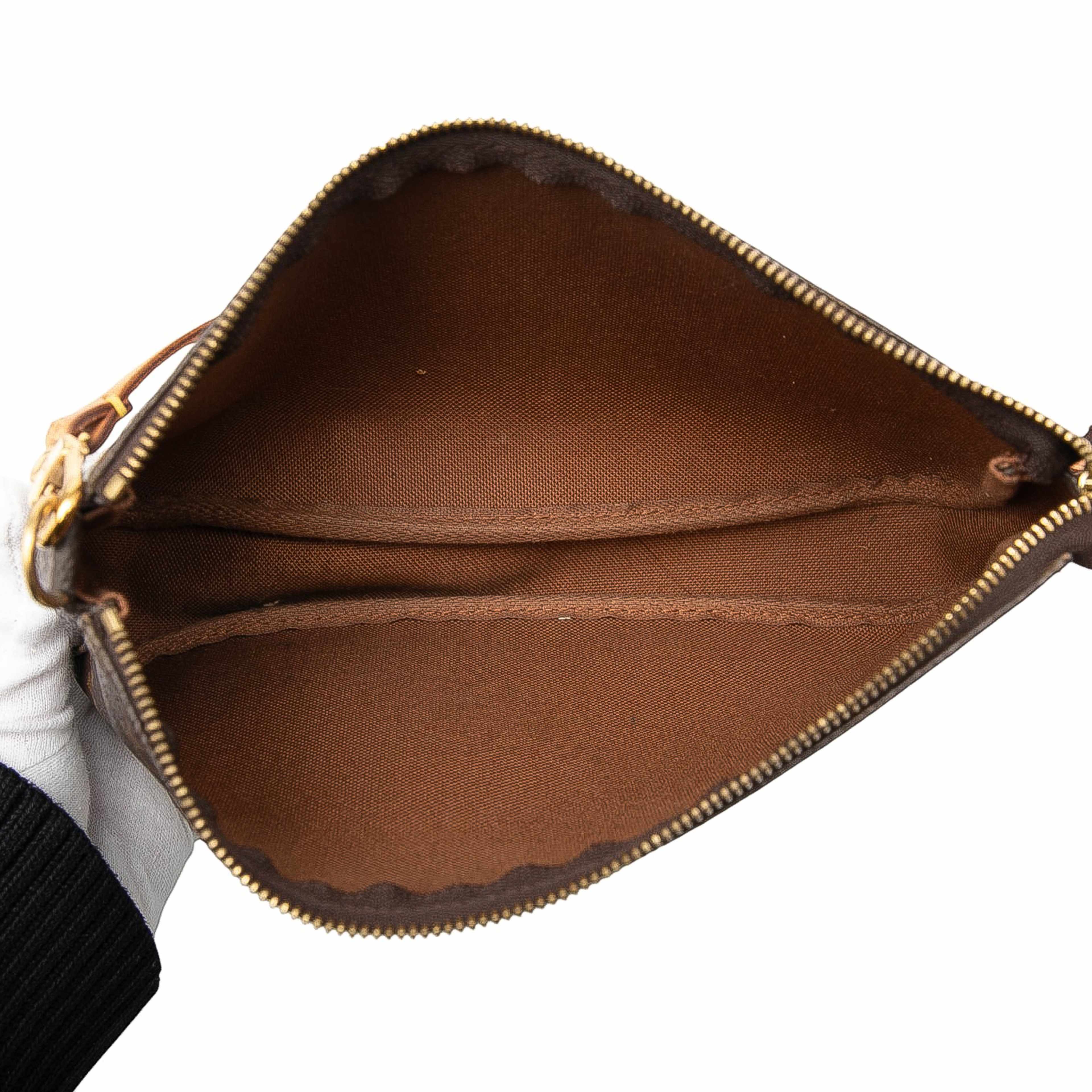 Louis Vuitton Monogram Pochette Accessoires, från Luxclusif, i färgen brown. Klicka för att öppna bilden i stort format