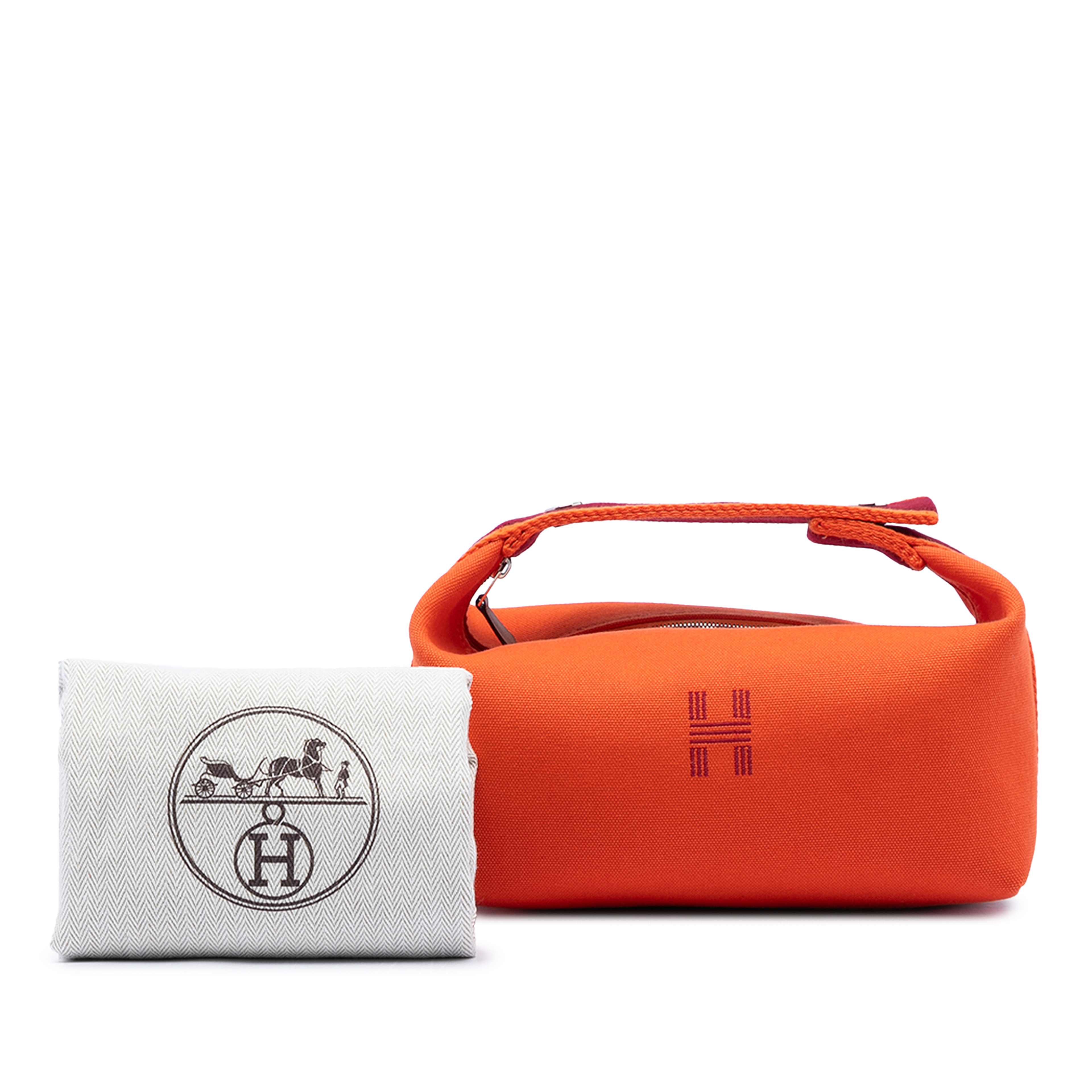 Hermès Small Toile Bride A Brac Case, från Luxclusif, i färgen orange. Klicka för att öppna bilden i stort format