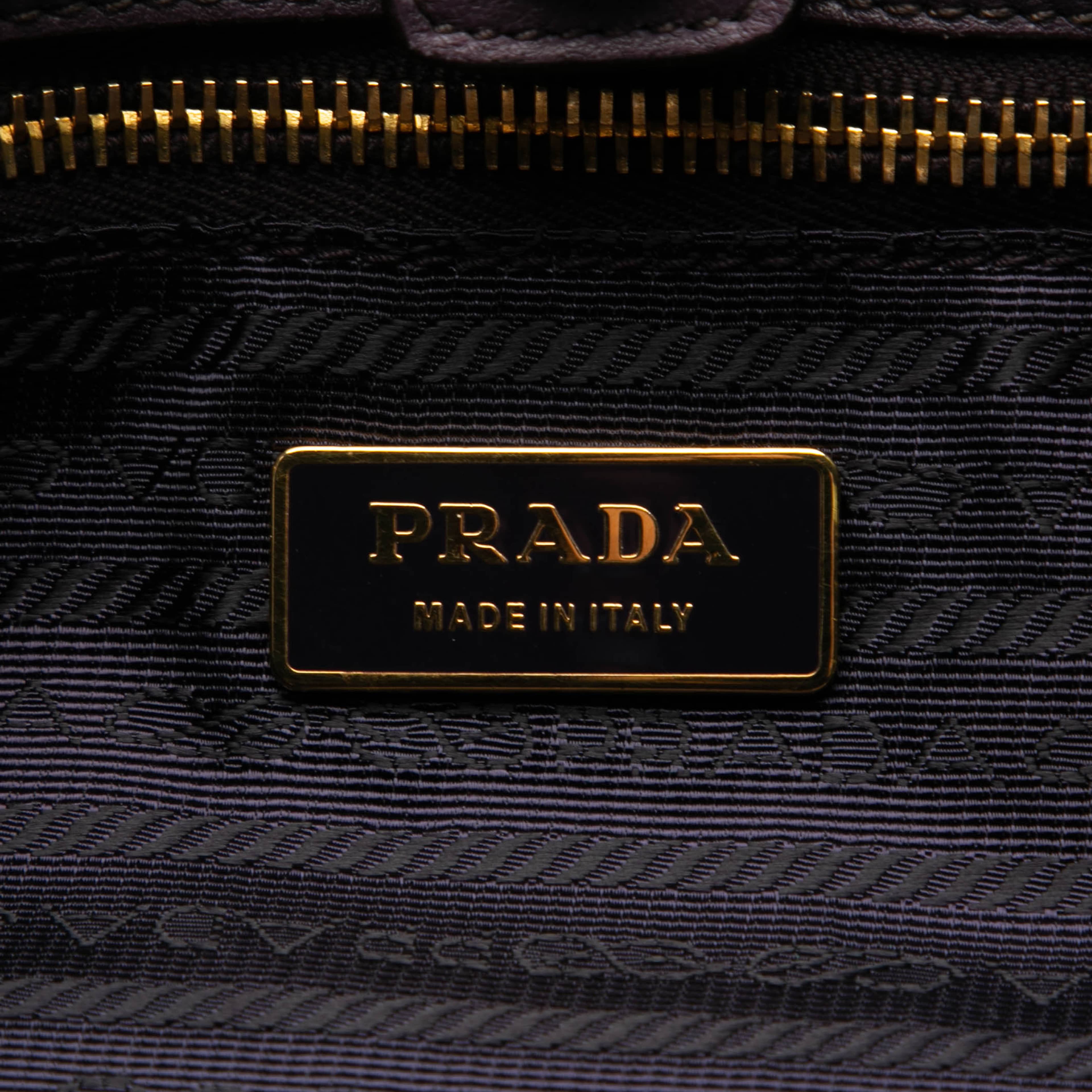 Prada Tessuto Fiocco Tote, från Luxclusif, i färgen purple. Klicka för att öppna bilden i stort format