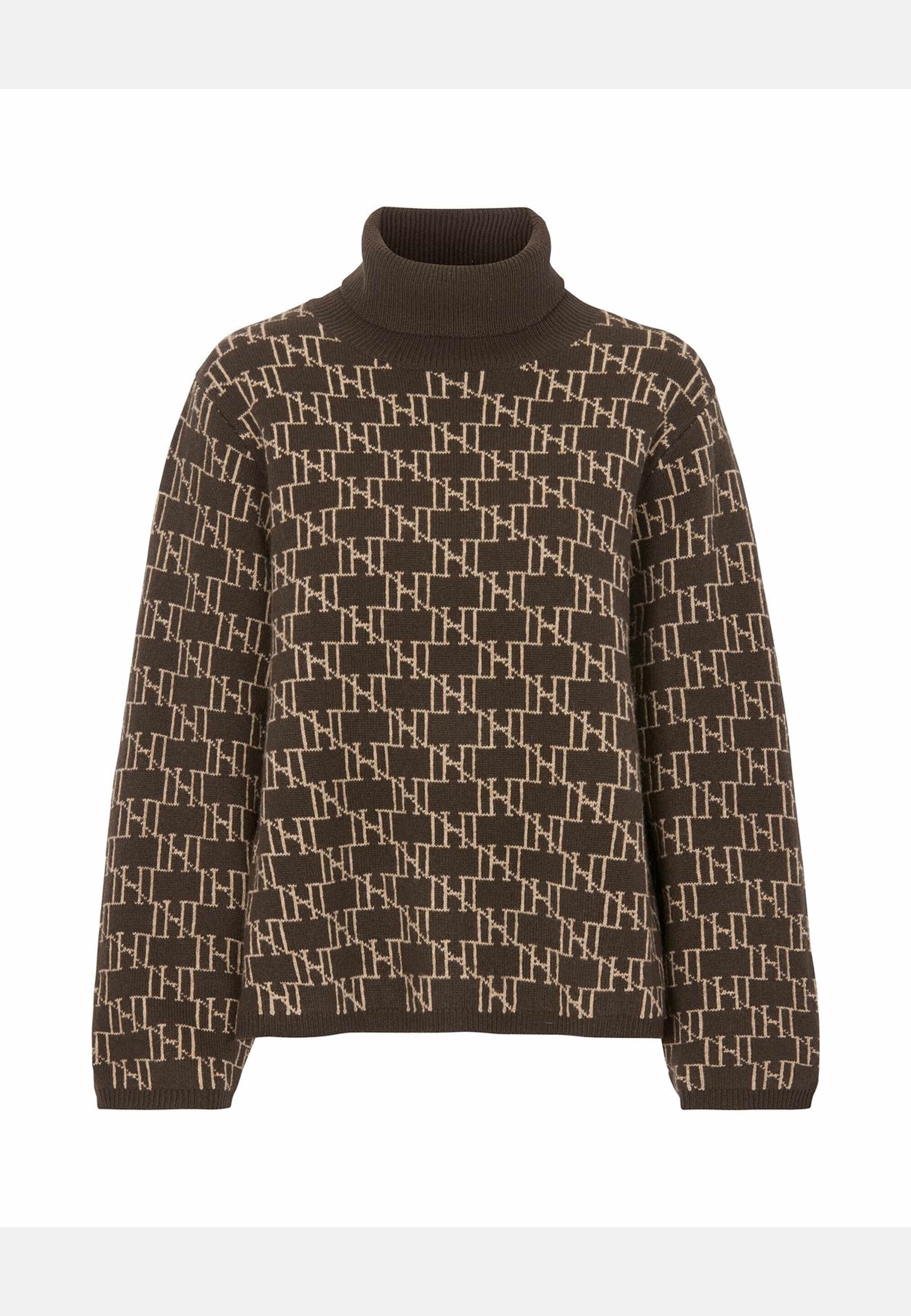 Polotröja Logo Alva, från Newhouse, i färgen brun. Klicka för att öppna bilden i stort format