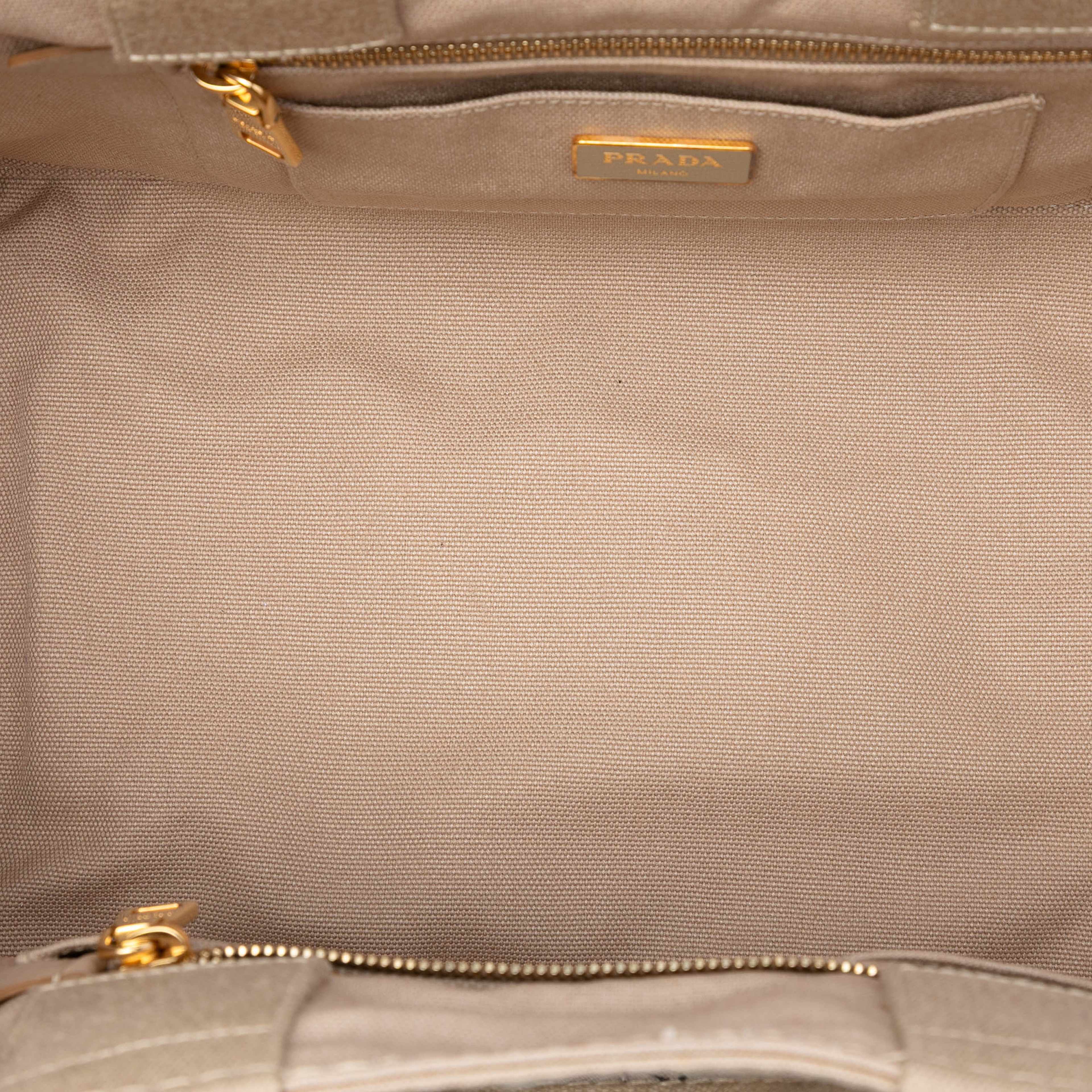 Prada Canvas Canapa Logo Satchel, från Luxclusif, i färgen beige. Klicka för att öppna bilden i stort format