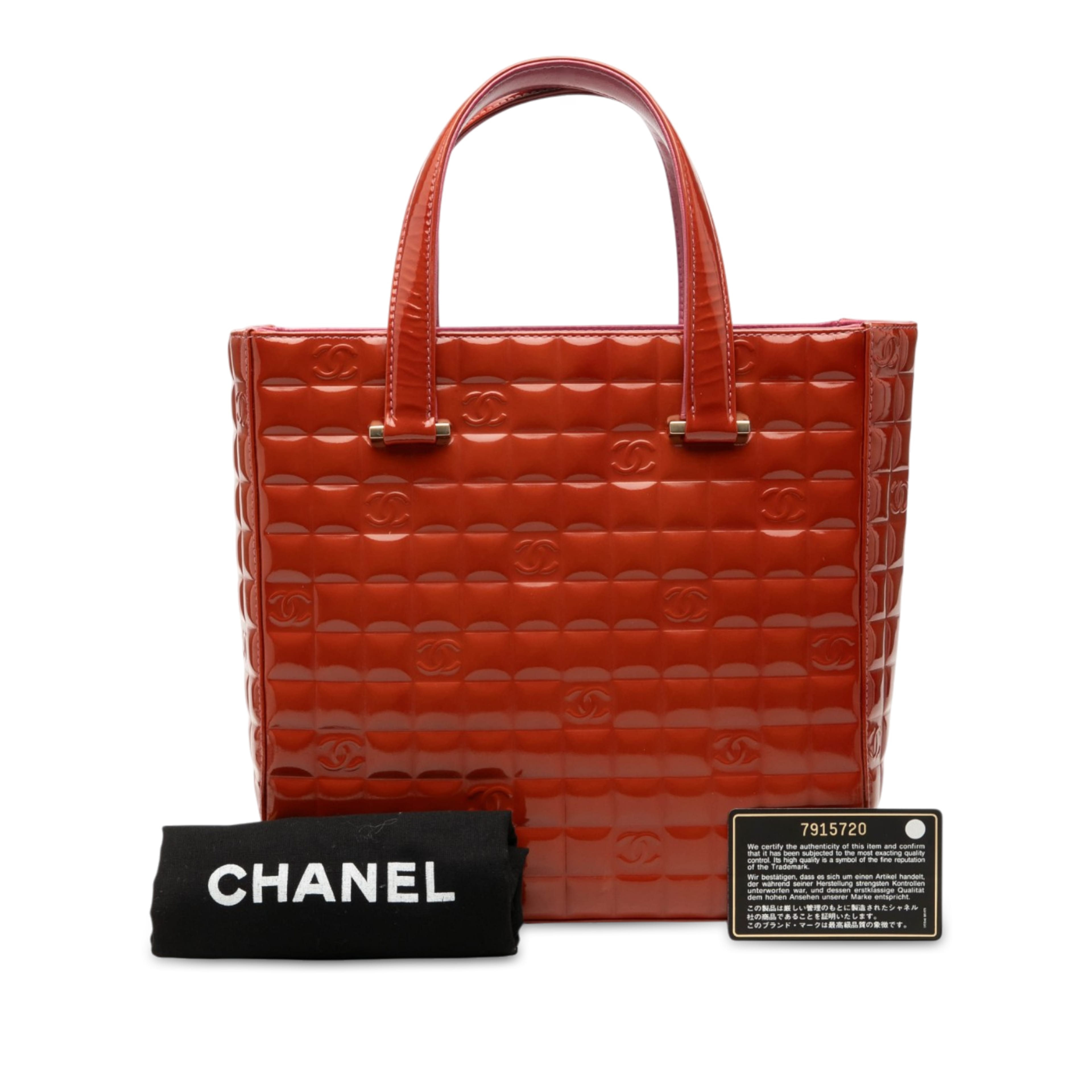 Chanel Cc Chocolate Bar Patent Tote, från Luxclusif, i färgen orange. Klicka för att öppna bilden i stort format