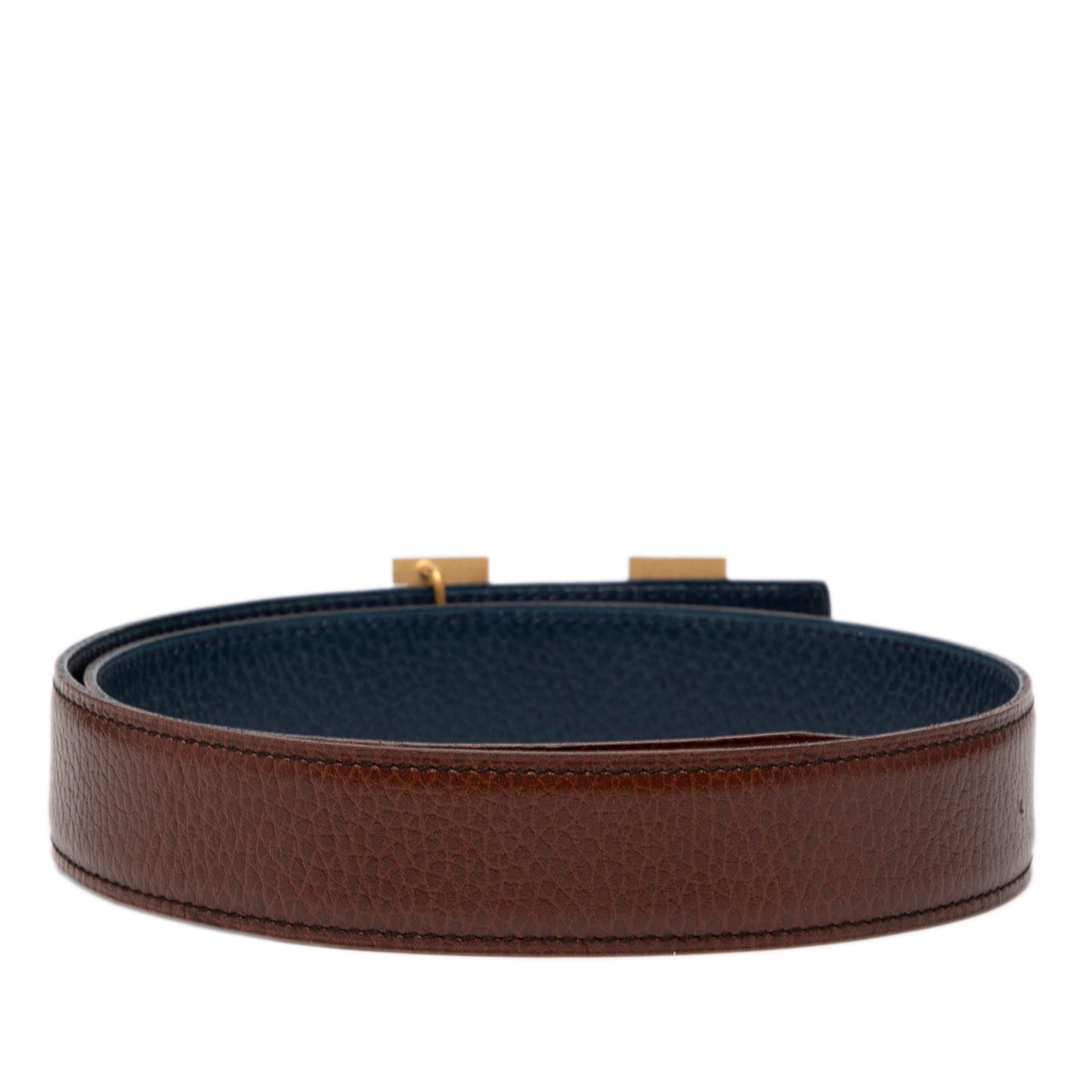 Hermès Togo Constance H Reversible Belt, från Luxclusif, i färgen brown. Klicka för att öppna bilden i stort format