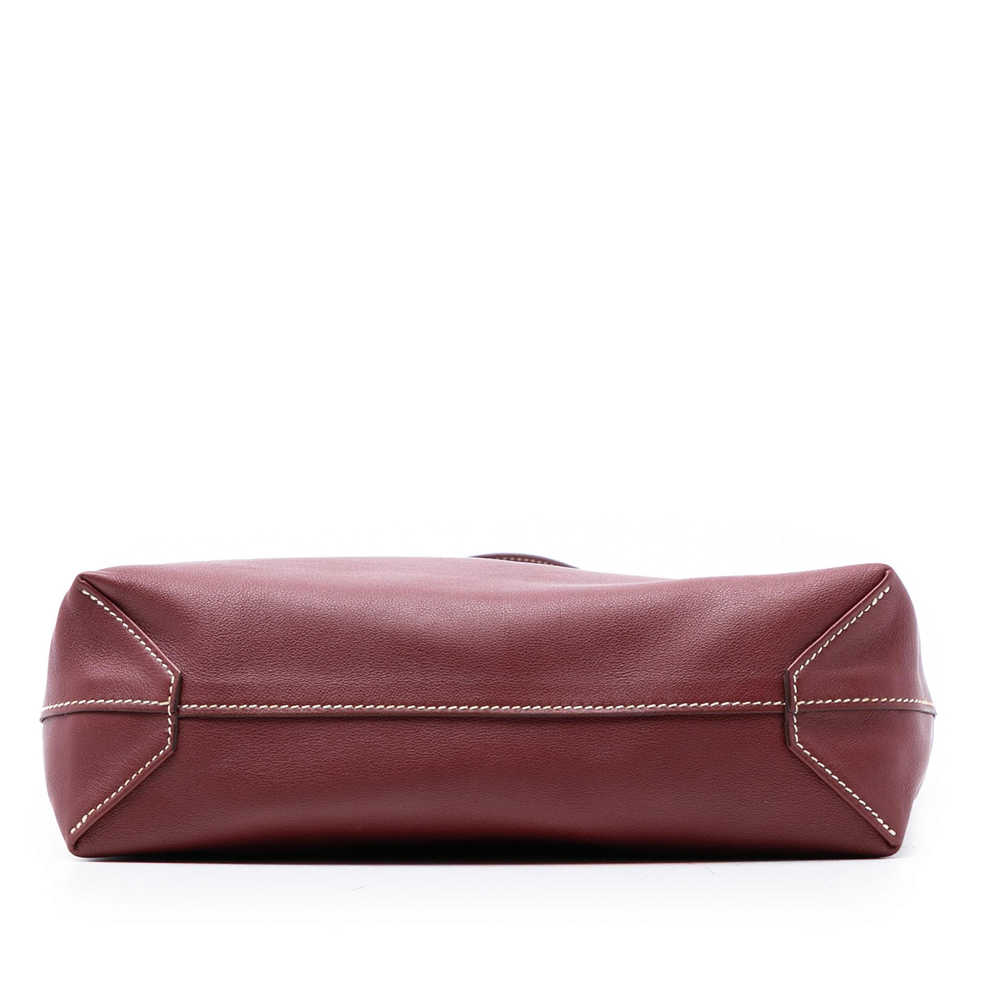 Hermès Swift And Veau Sikkim Double Sens 28, från Luxclusif, i färgen dark red. Klicka för att öppna bilden i stort format