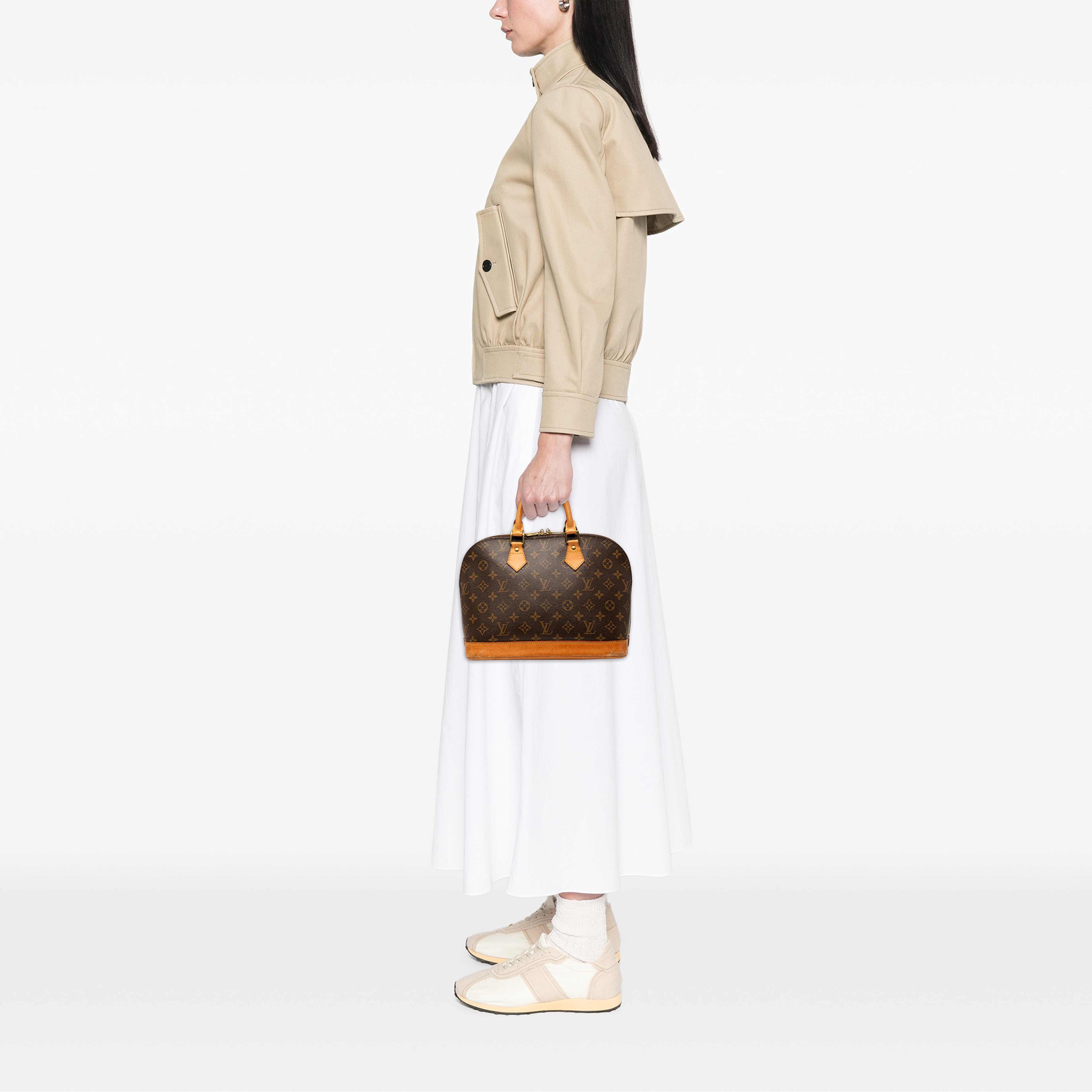 Louis Vuitton Monogram Alma Pm, från Luxclusif, i färgen brun. Klicka för att öppna bilden i stort format