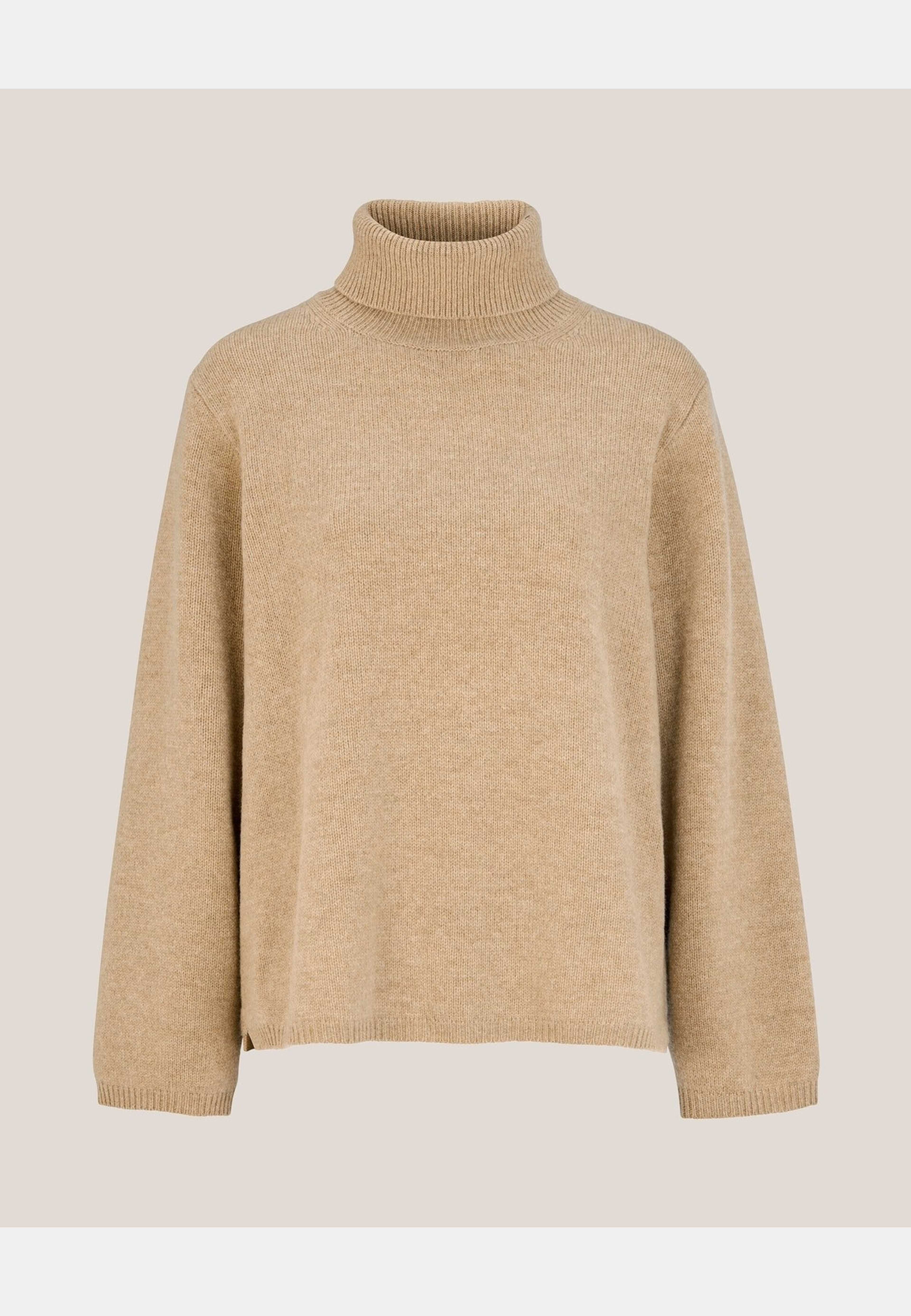 Polotröja Alva, från Newhouse, i färgen beige. Klicka för att öppna bilden i stort format