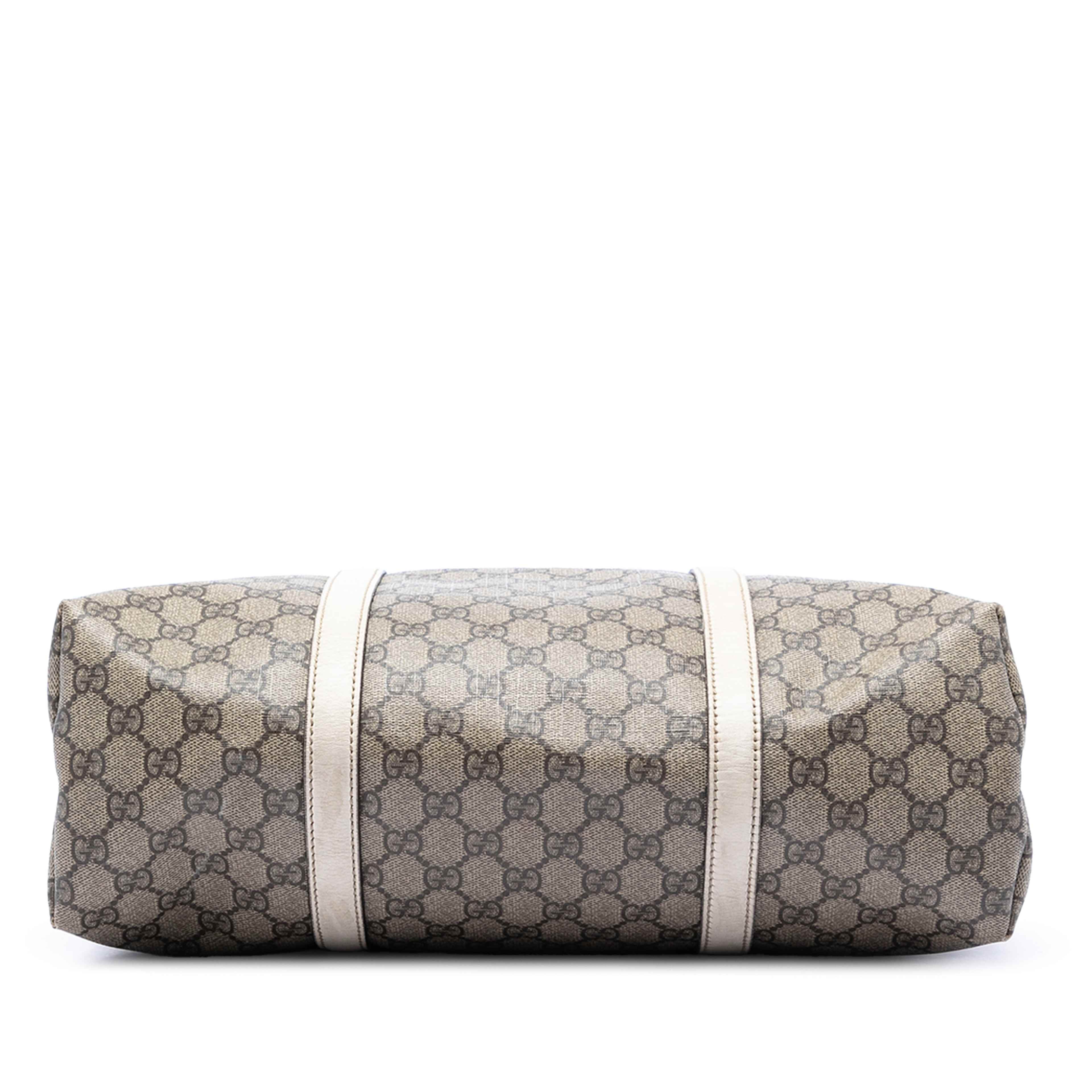 Gucci Gg Supreme Joy Vertical Tote, från Luxclusif, i färgen beige. Klicka för att öppna bilden i stort format