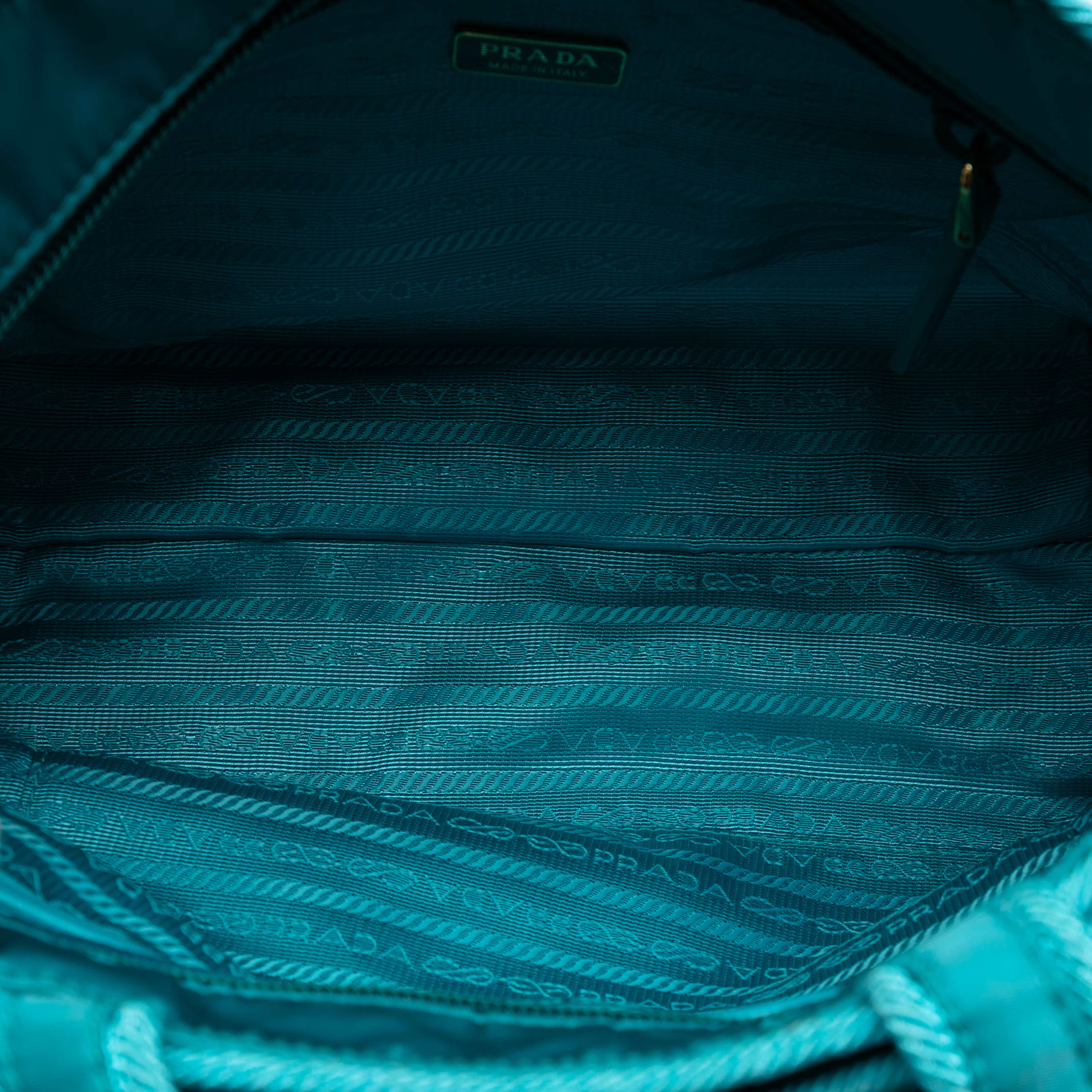 Prada Tessuto Canapa Logo Bow Satchel, från Luxclusif, i färgen turquoise. Klicka för att öppna bilden i stort format