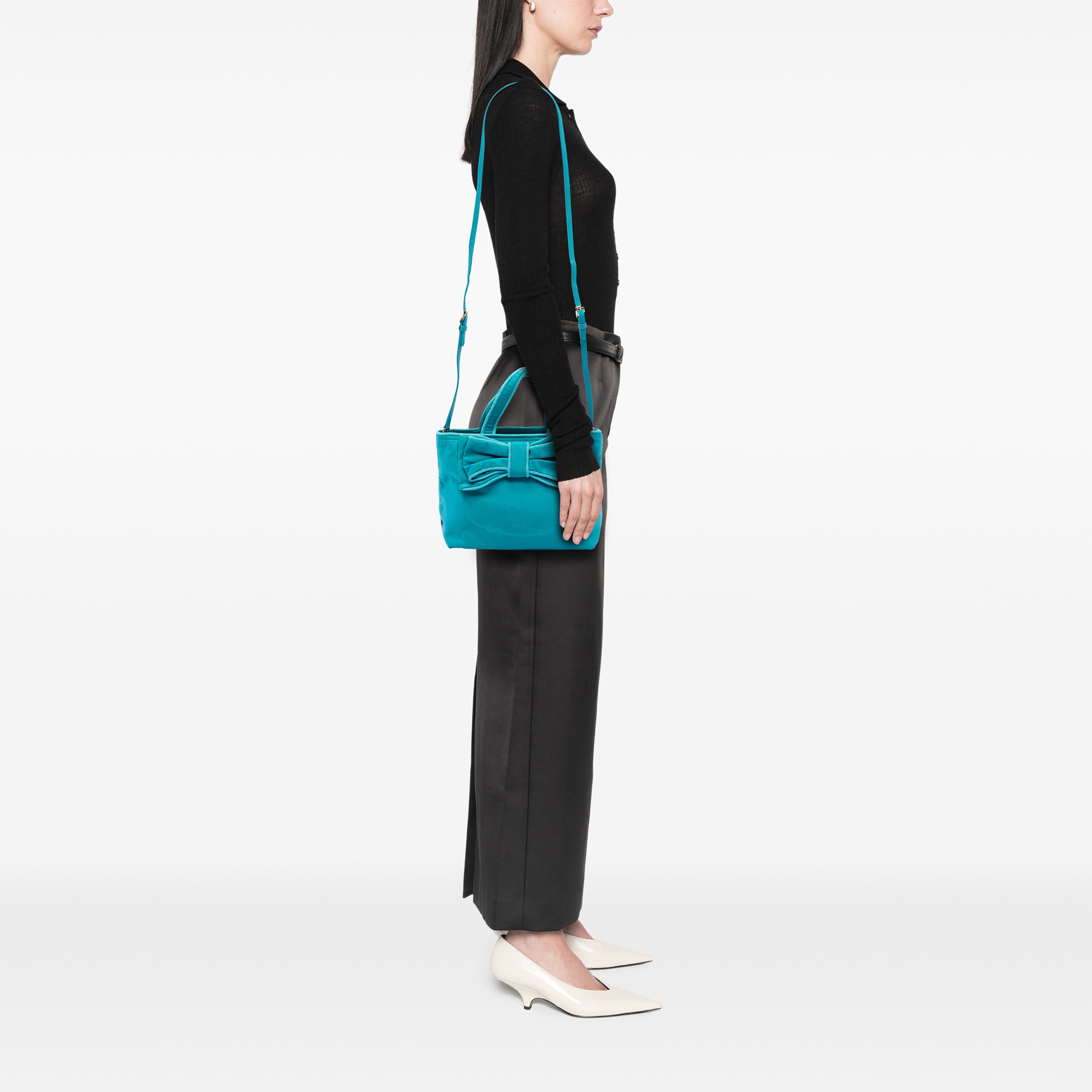 Prada Tessuto Canapa Logo Bow Satchel, från Luxclusif, i färgen blå. Klicka för att öppna bilden i stort format