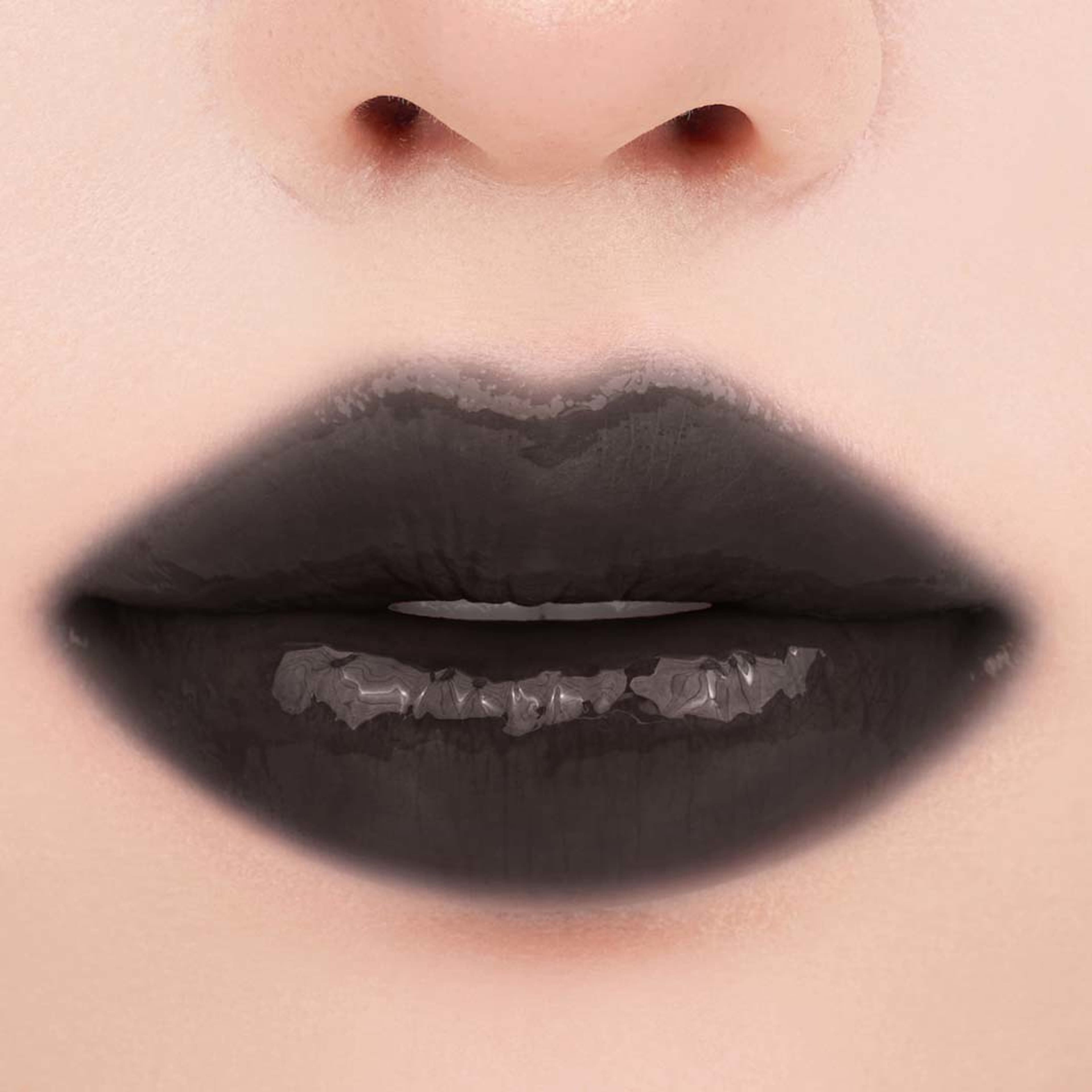 THE JUICY LASTING TINT MINI, från rom&nd, i färgen Black Berry. Klicka för att öppna bilden i stort format