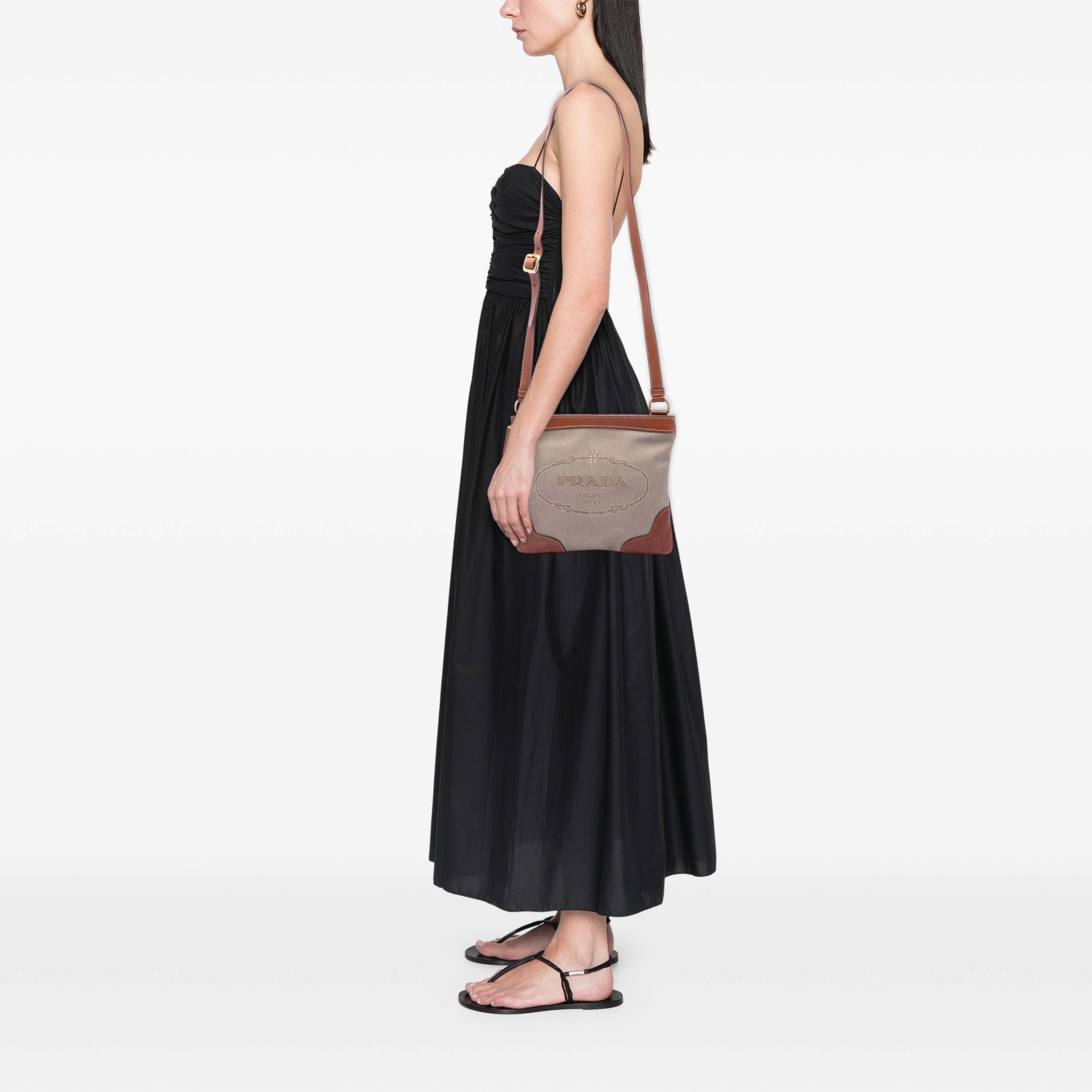 Prada Canvas Canapa Logo Crossbody, från Luxclusif, i färgen beige. Klicka för att öppna bilden i stort format