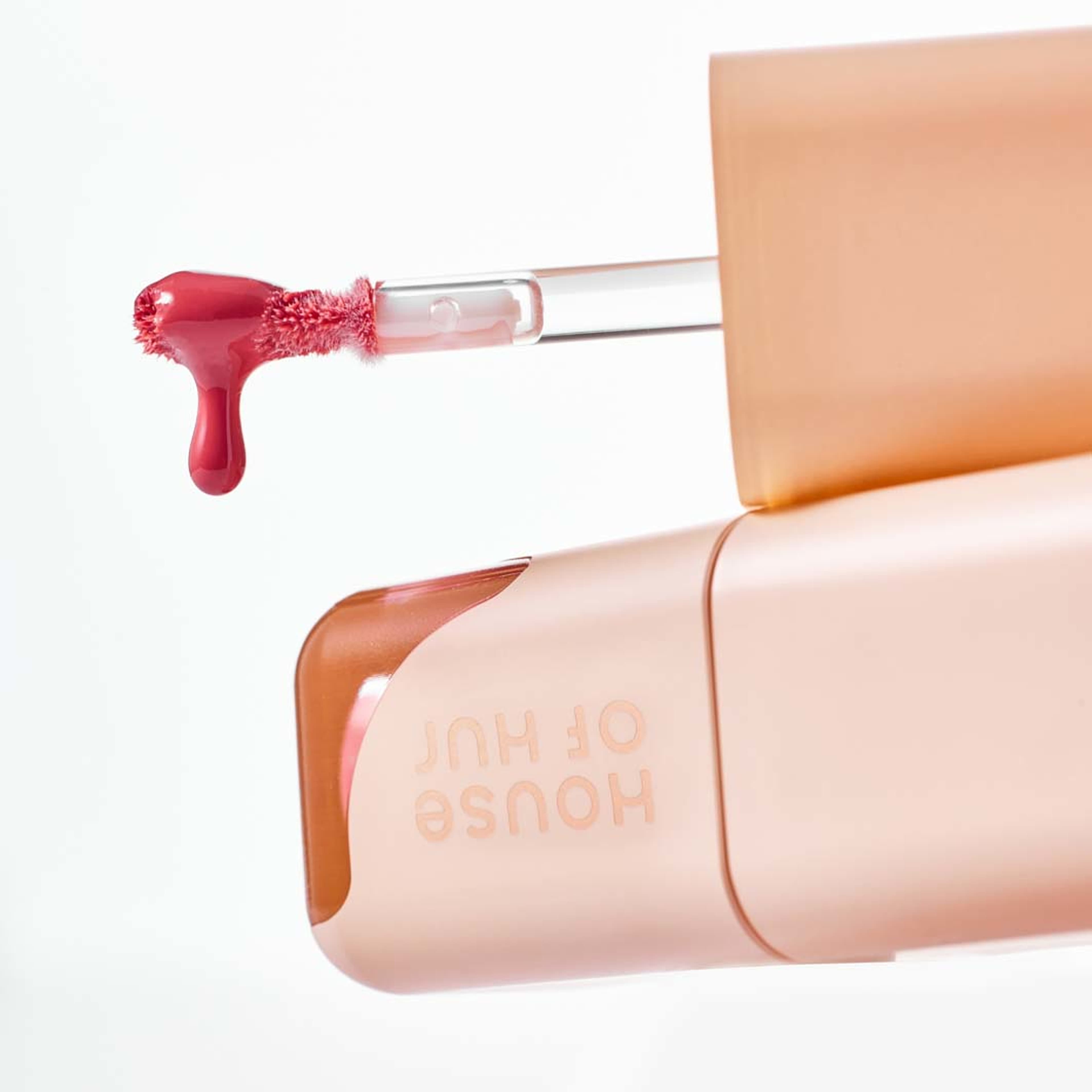 Glowy Ampoule Tint, från House of Hur, i färgen Dawn Pink. Klicka för att öppna bilden i stort format