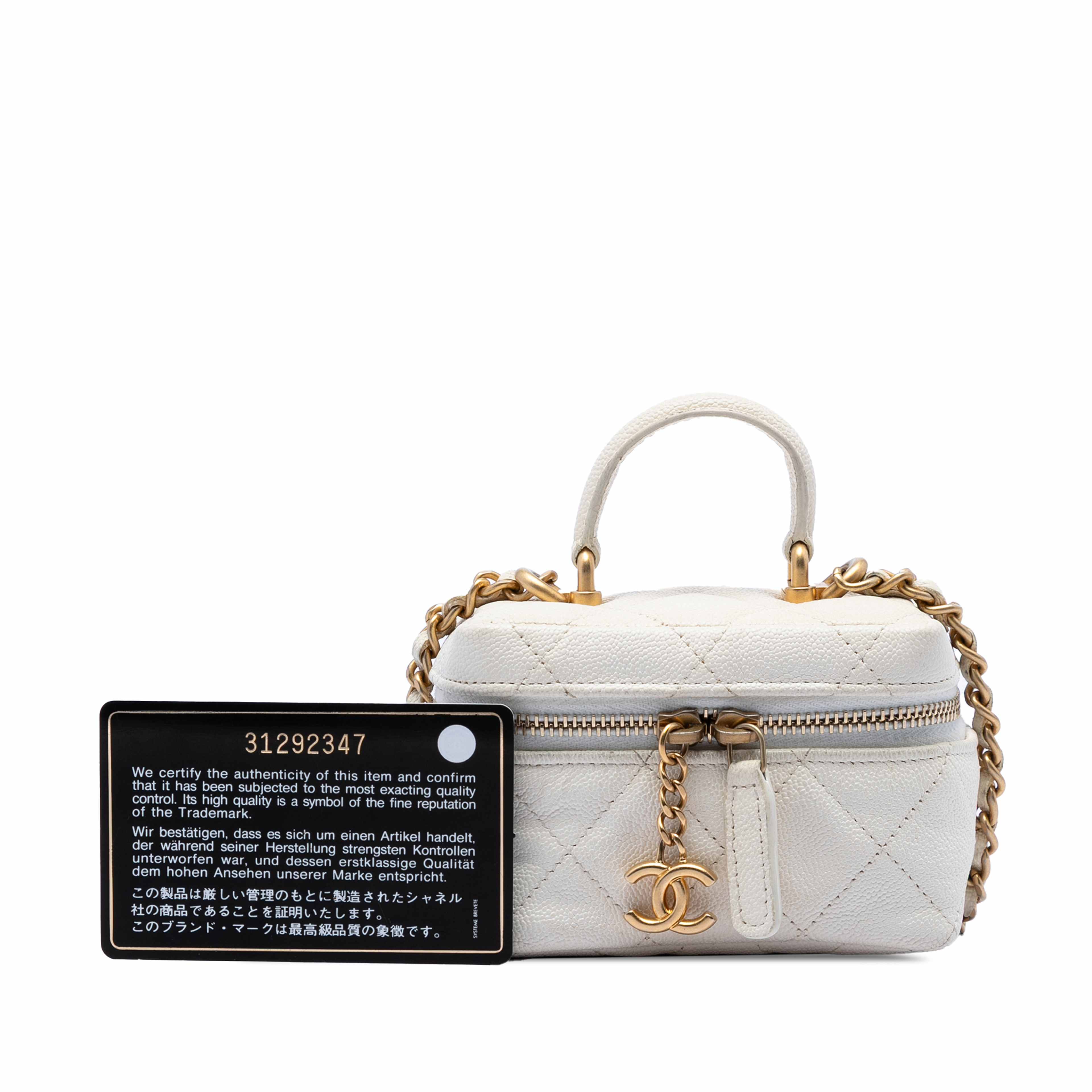 Chanel Mini Caviar Chain Zip Around Vanity Case, från Luxclusif, i färgen vit. Klicka för att öppna bilden i stort format
