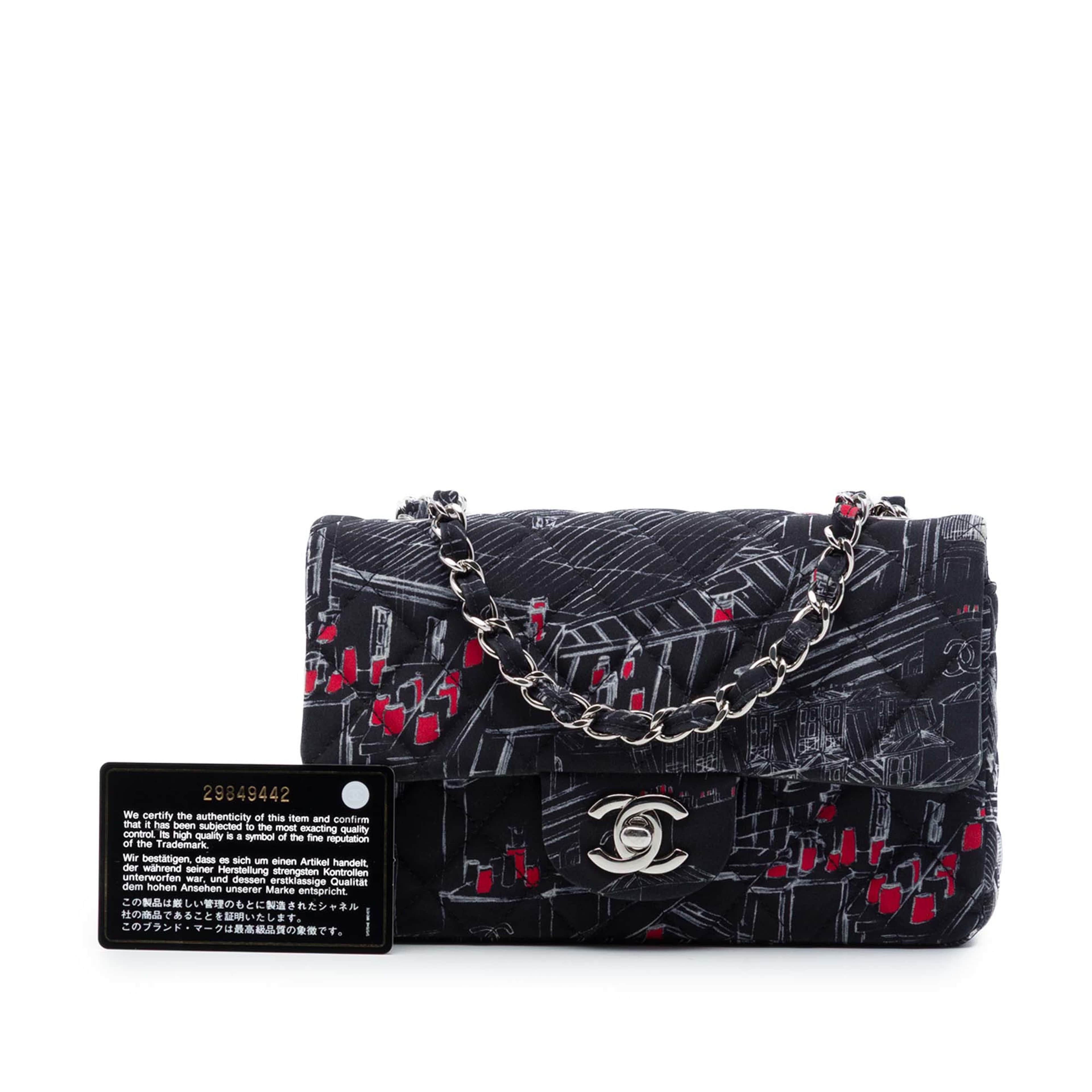 Chanel Mini Classic Canvas Parisian Rooftop Single Flap, från Luxclusif, i färgen svart. Klicka för att öppna bilden i stort format