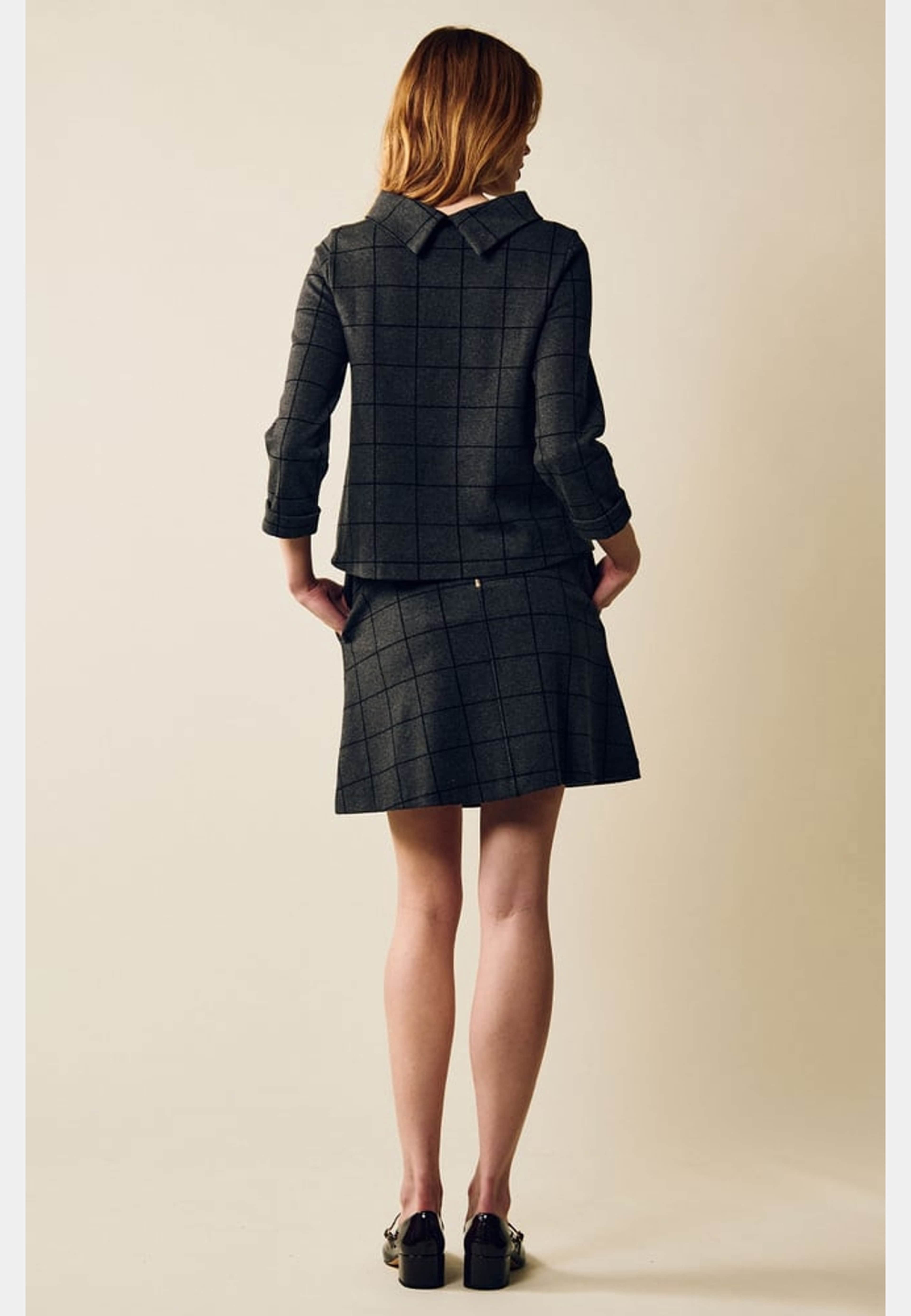 Melina Check Skirt, från Jumperfabriken, i färgen grey. Klicka för att öppna bilden i stort format