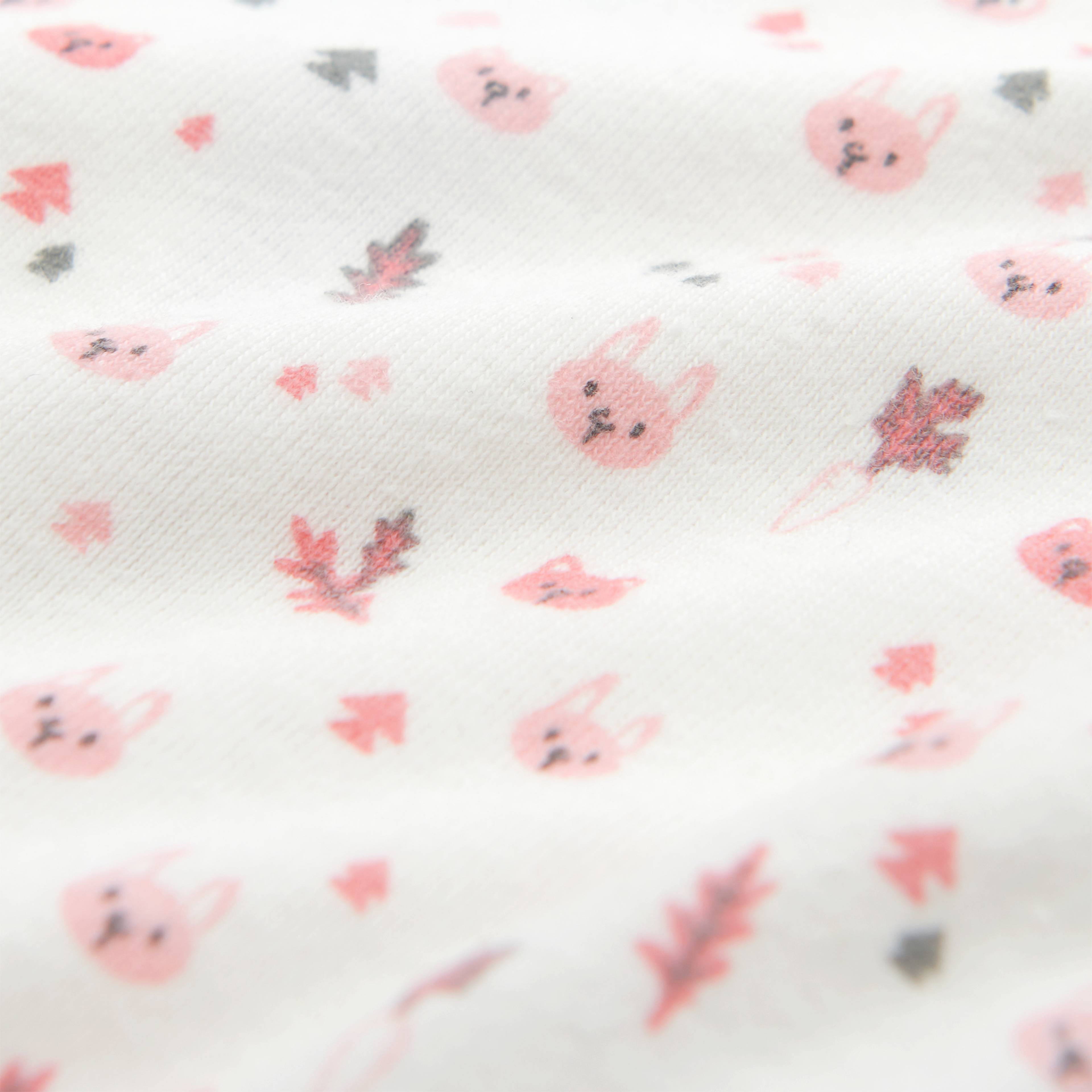 Omlottbody i ekologisk bomull RABBITS, från Åhléns, i färgen Primropink. Klicka för att öppna bilden i stort format