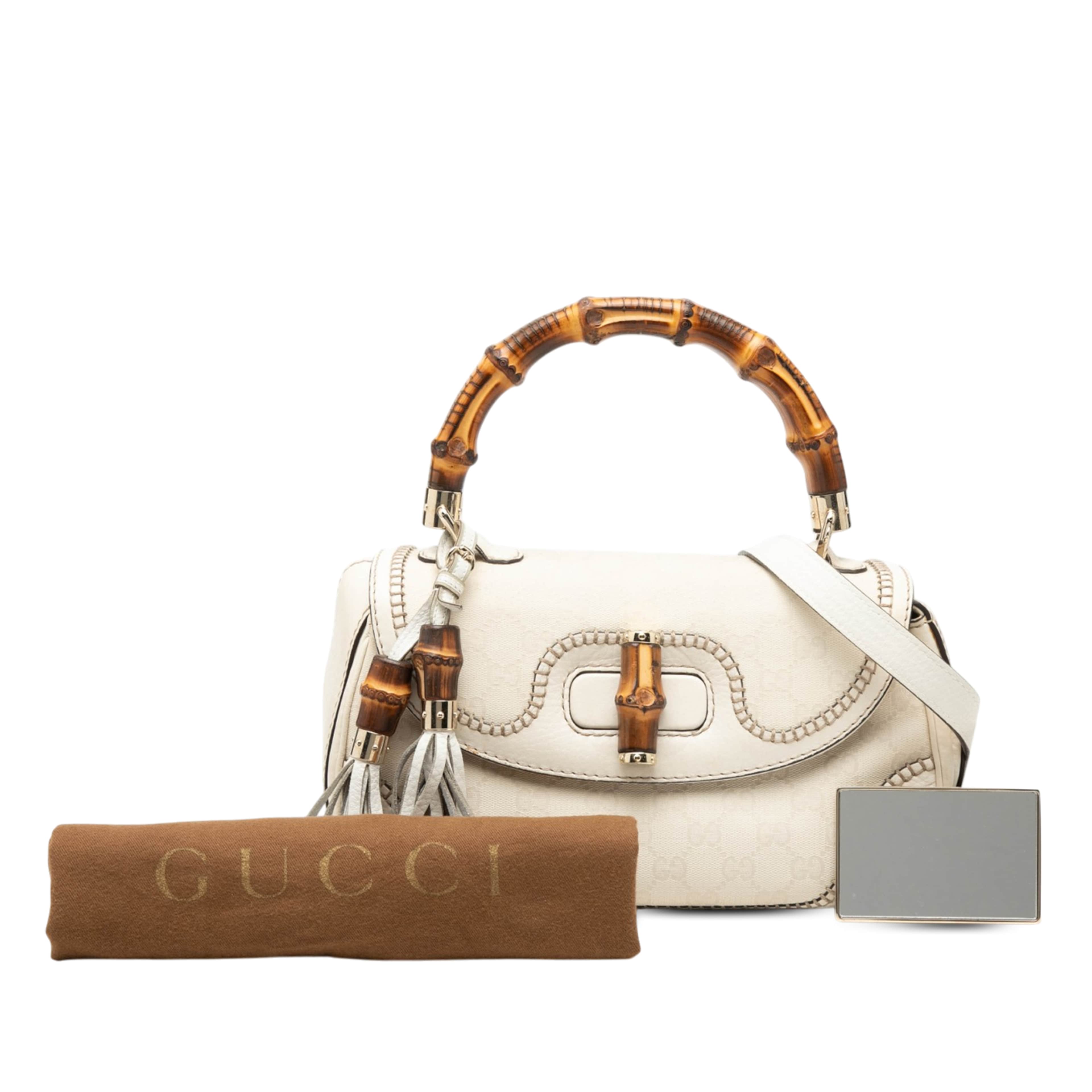 Gucci Medium Gg Canvas New Bamboo Satchel, från Luxclusif, i färgen vit. Klicka för att öppna bilden i stort format