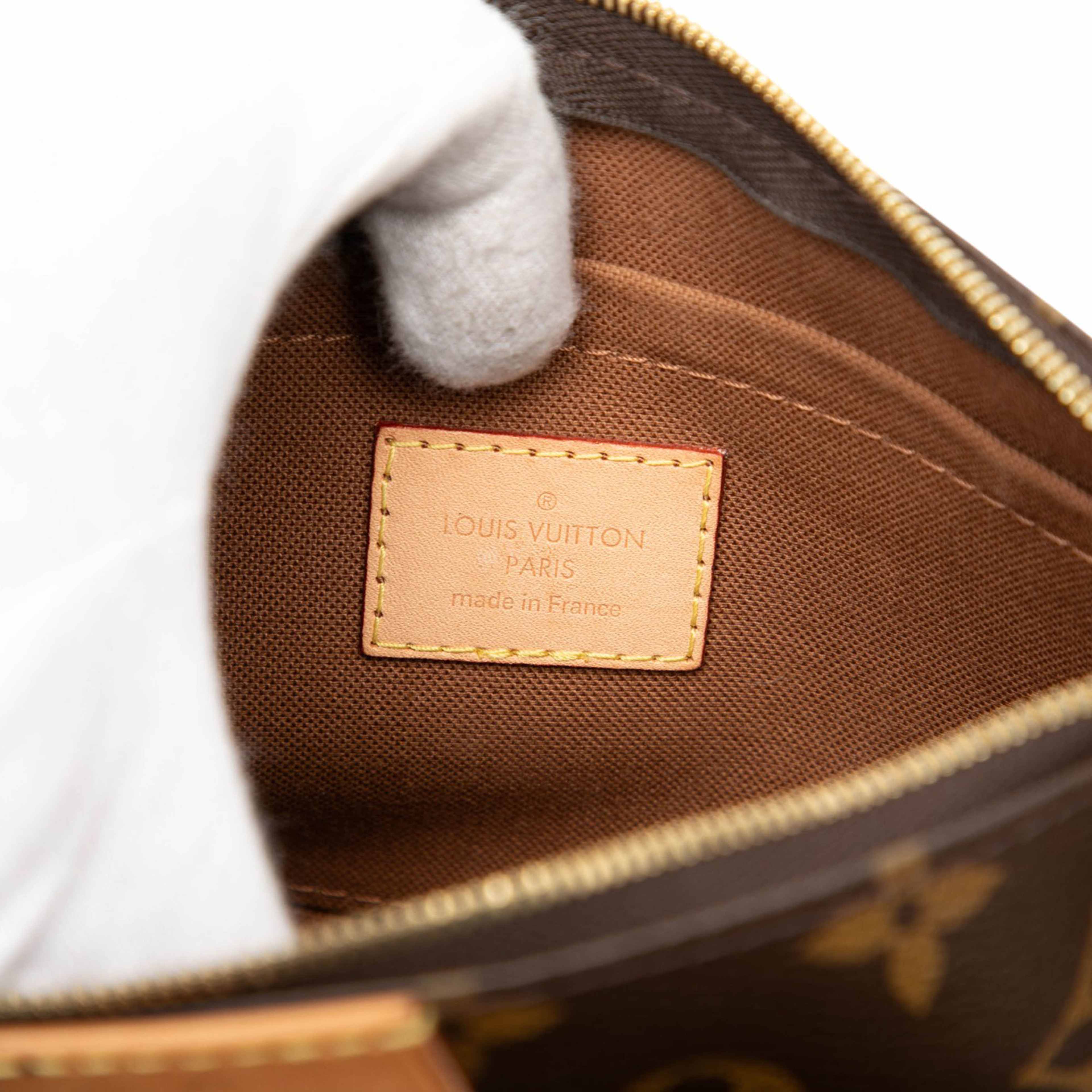 Louis Vuitton Monogram Multi Pochette Accessoires, från Luxclusif, i färgen brown. Klicka för att öppna bilden i stort format