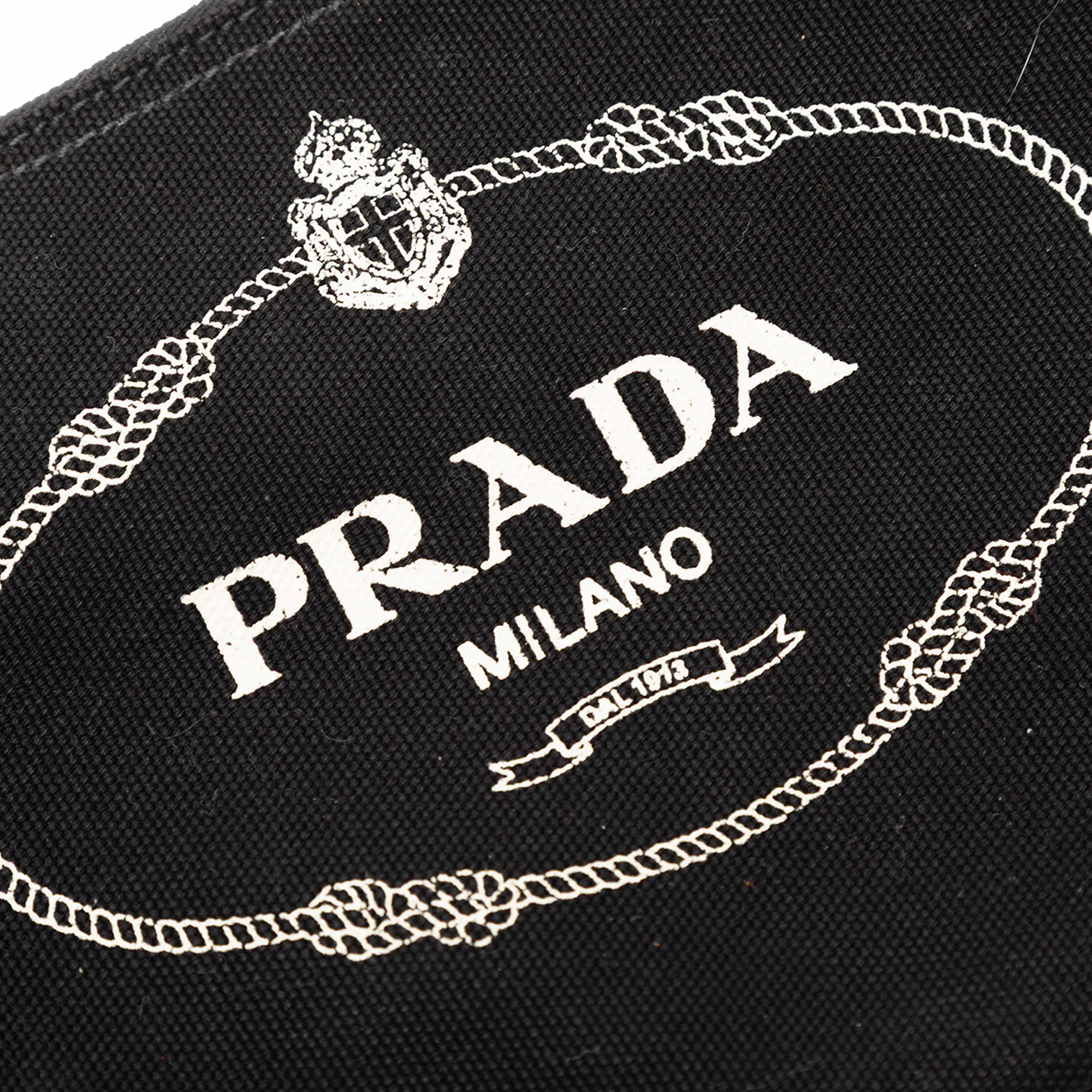 Prada Canvas Canapa Logo Pouch, från Luxclusif, i färgen black. Klicka för att öppna bilden i stort format