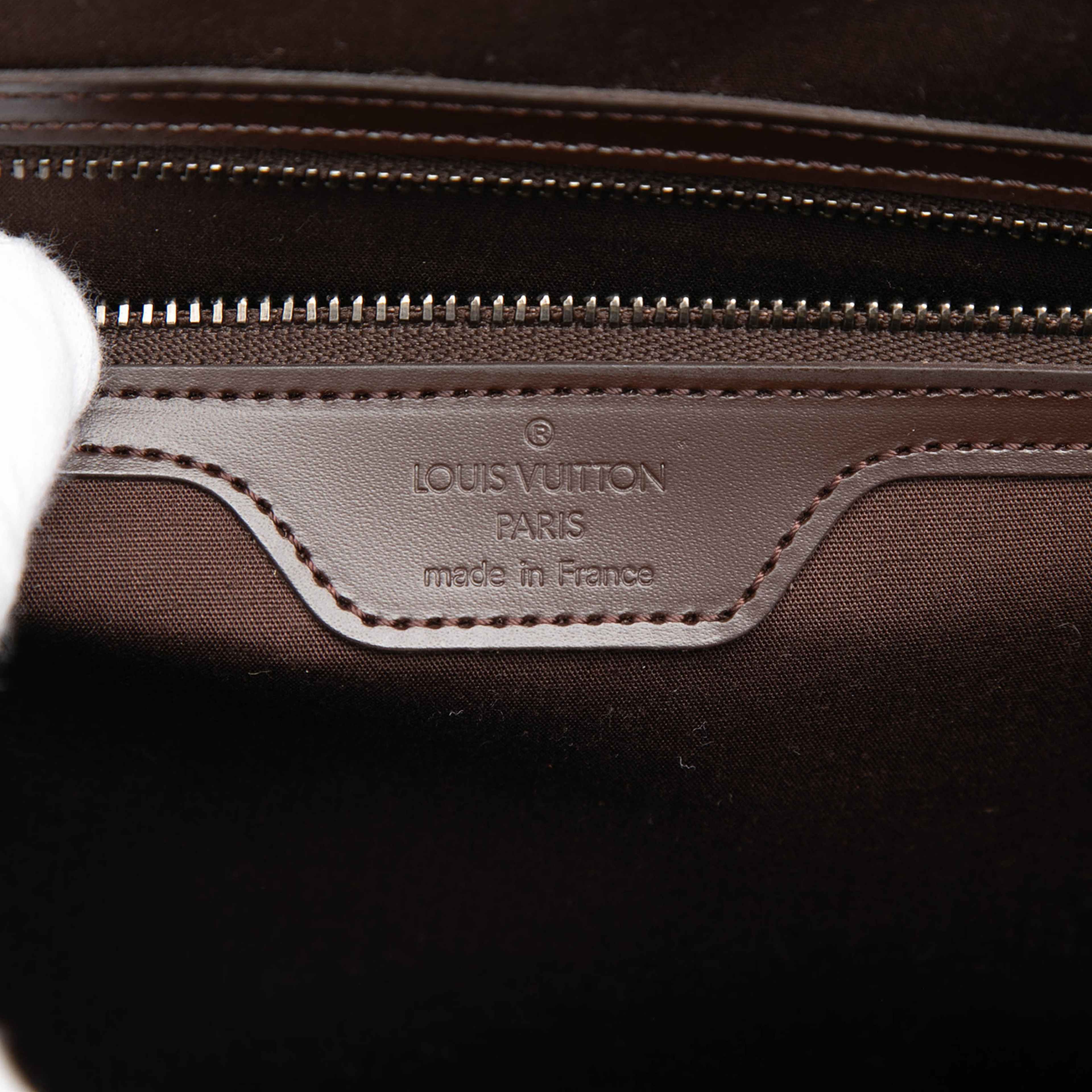 Louis Vuitton Epi Saint Tropez, från Luxclusif, i färgen brun. Klicka för att öppna bilden i stort format