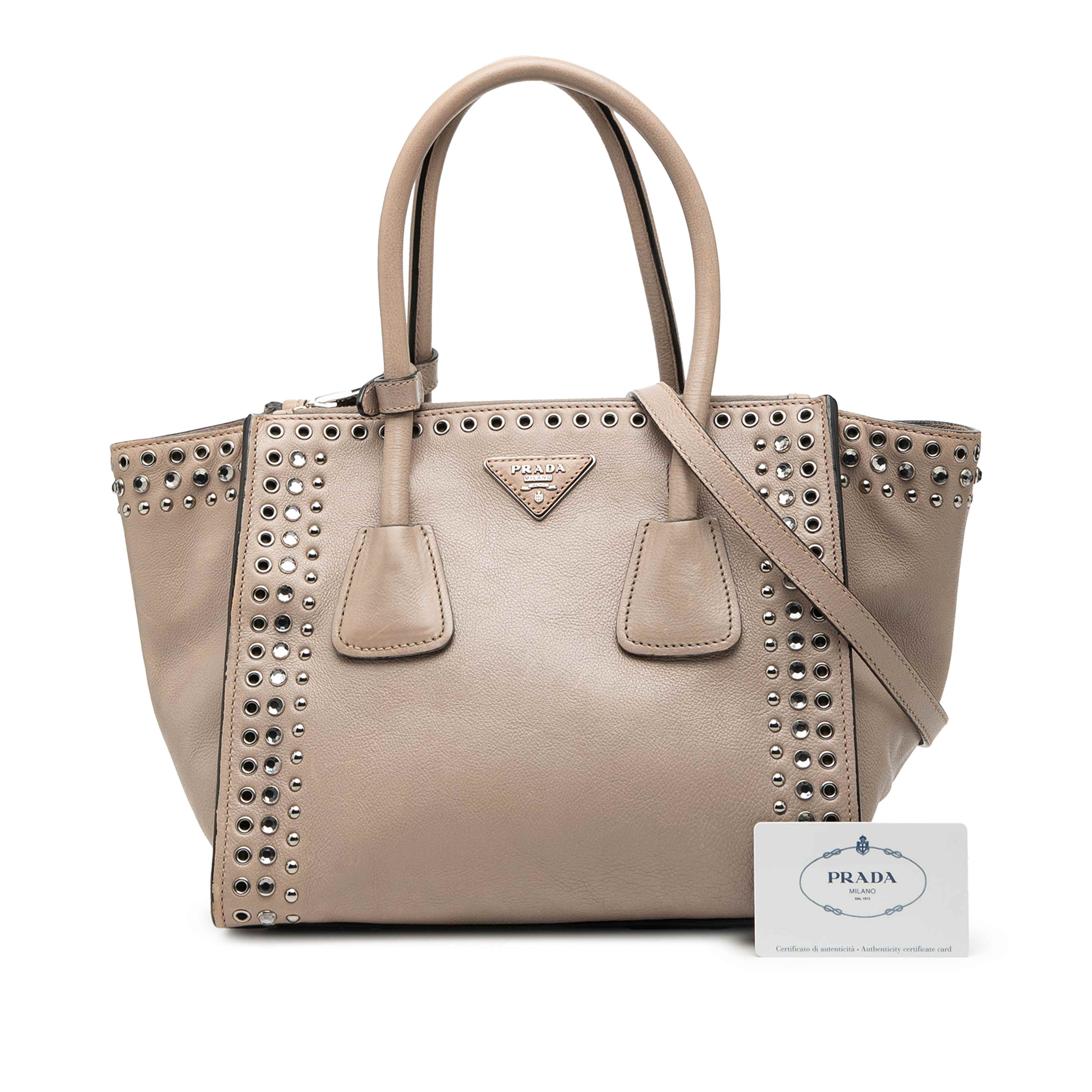 Prada Glace Calf Studded Twin Pocket Satchel, från Luxclusif, i färgen beige. Klicka för att öppna bilden i stort format