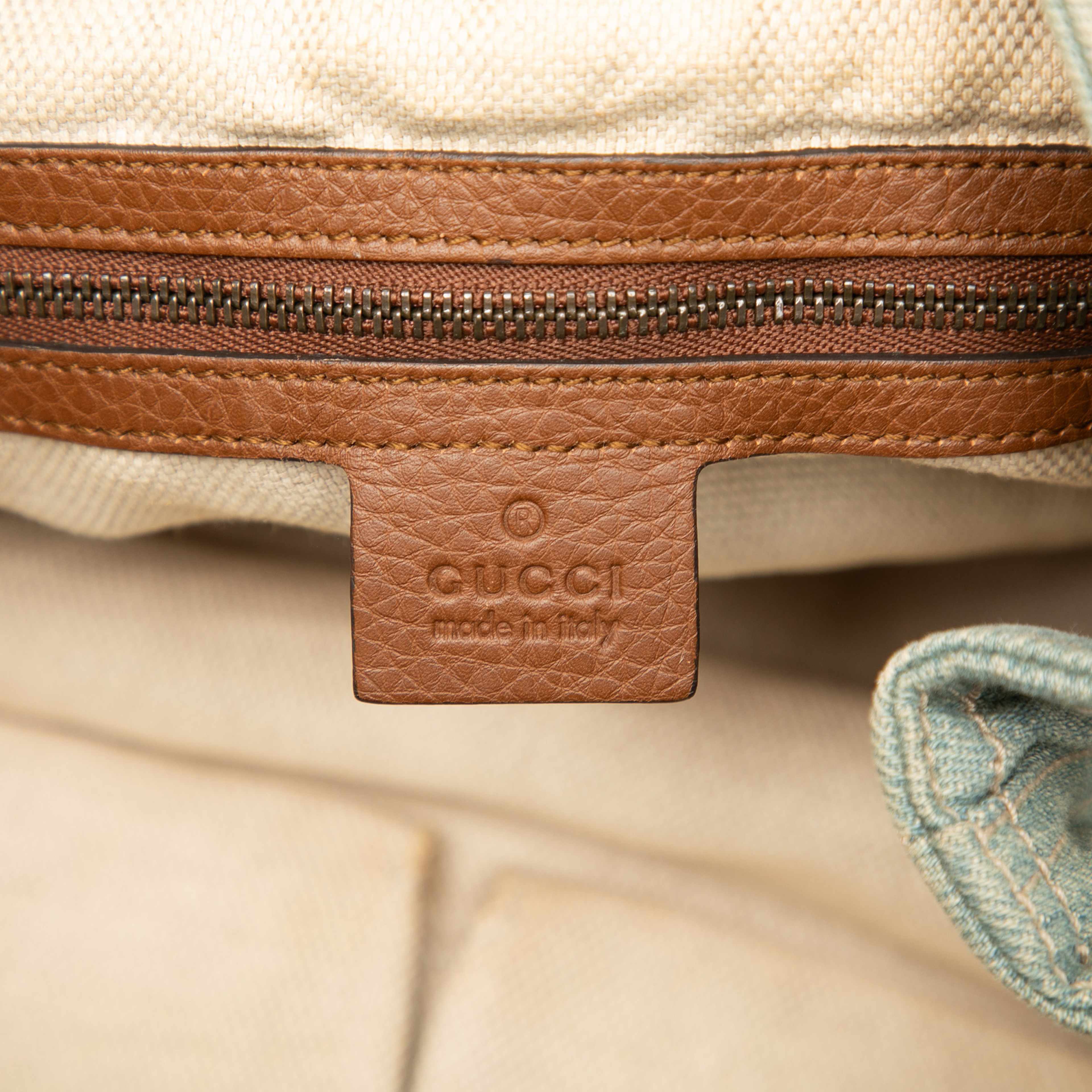 Gucci Medium Denim Soho Chain Tote, från Luxclusif, i färgen denim. Klicka för att öppna bilden i stort format