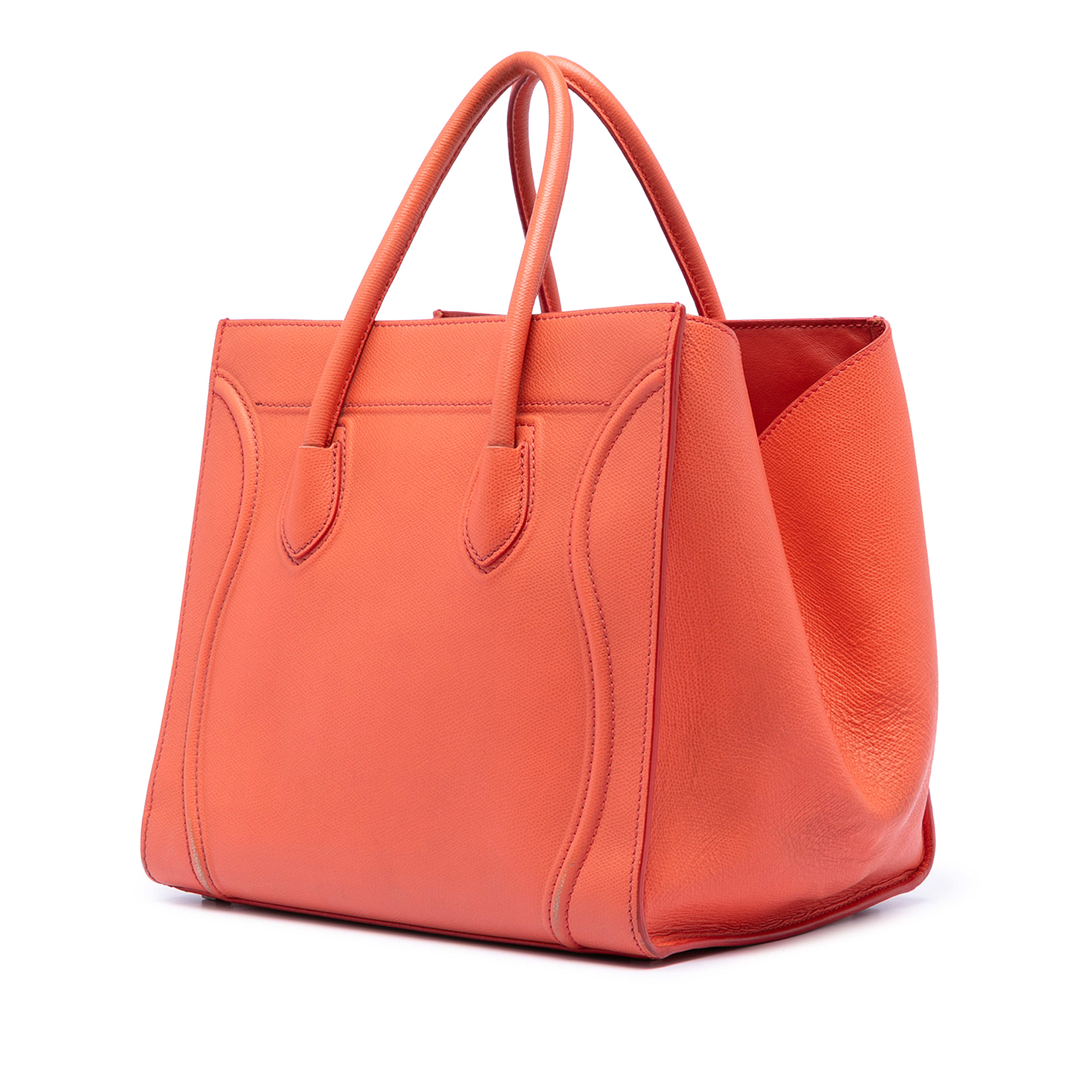 Celine Medium Leather Phantom Luggage Tote, från Luxclusif, i färgen orange. Klicka för att öppna bilden i stort format