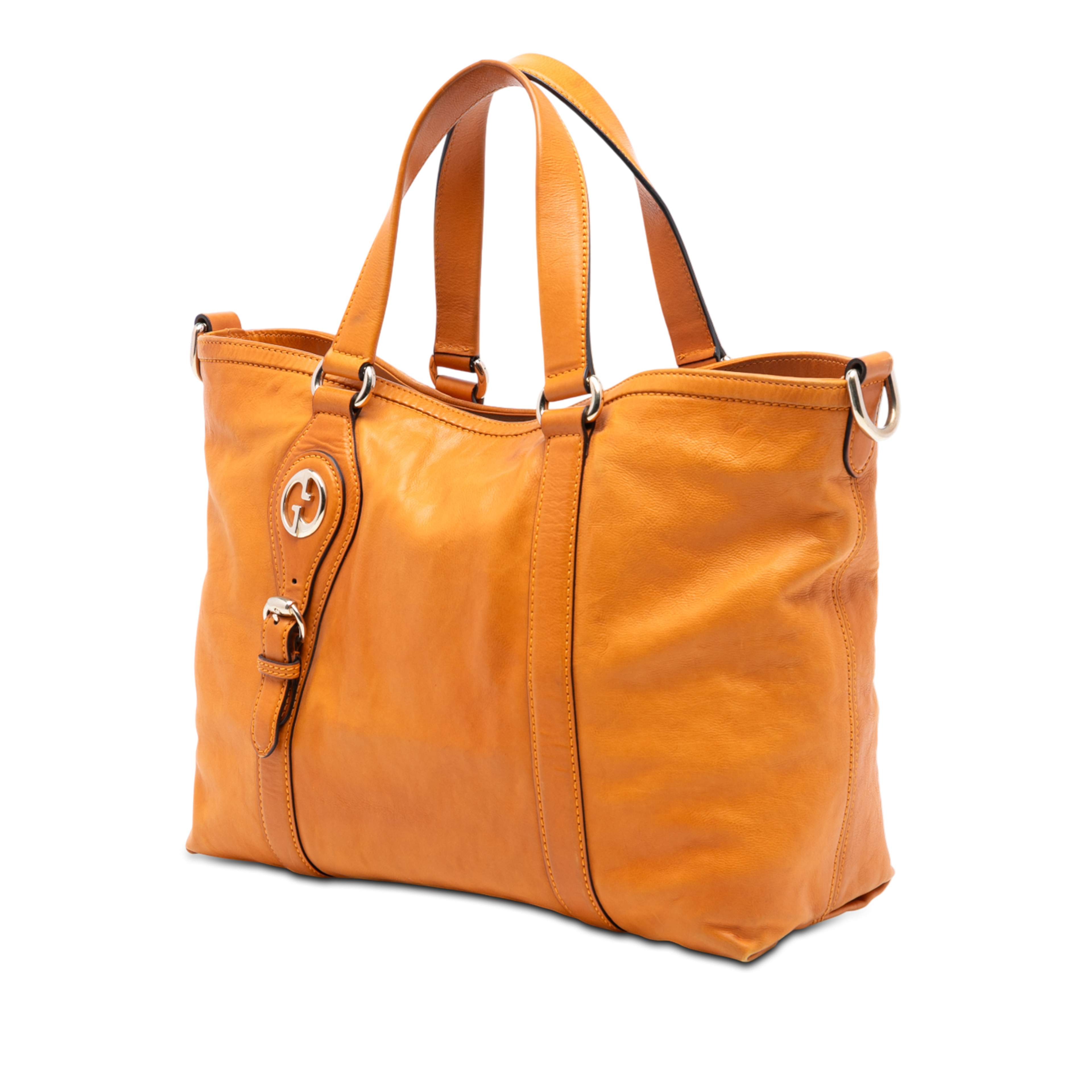 Gucci Leather 1973 Satchel, från Luxclusif, i färgen orange. Klicka för att öppna bilden i stort format