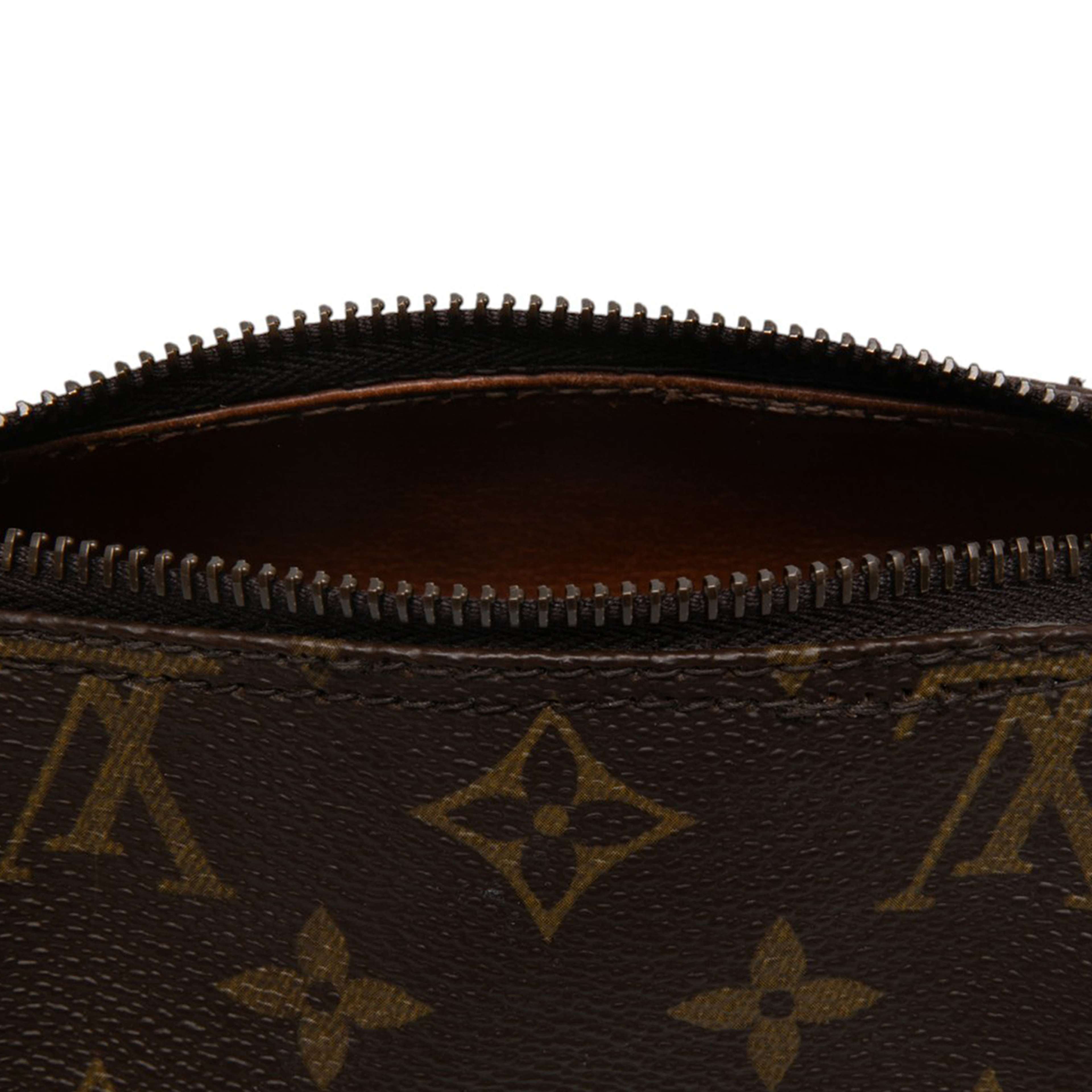 Louis Vuitton Monogram Papillon Pochette, från Luxclusif, i färgen brun. Klicka för att öppna bilden i stort format