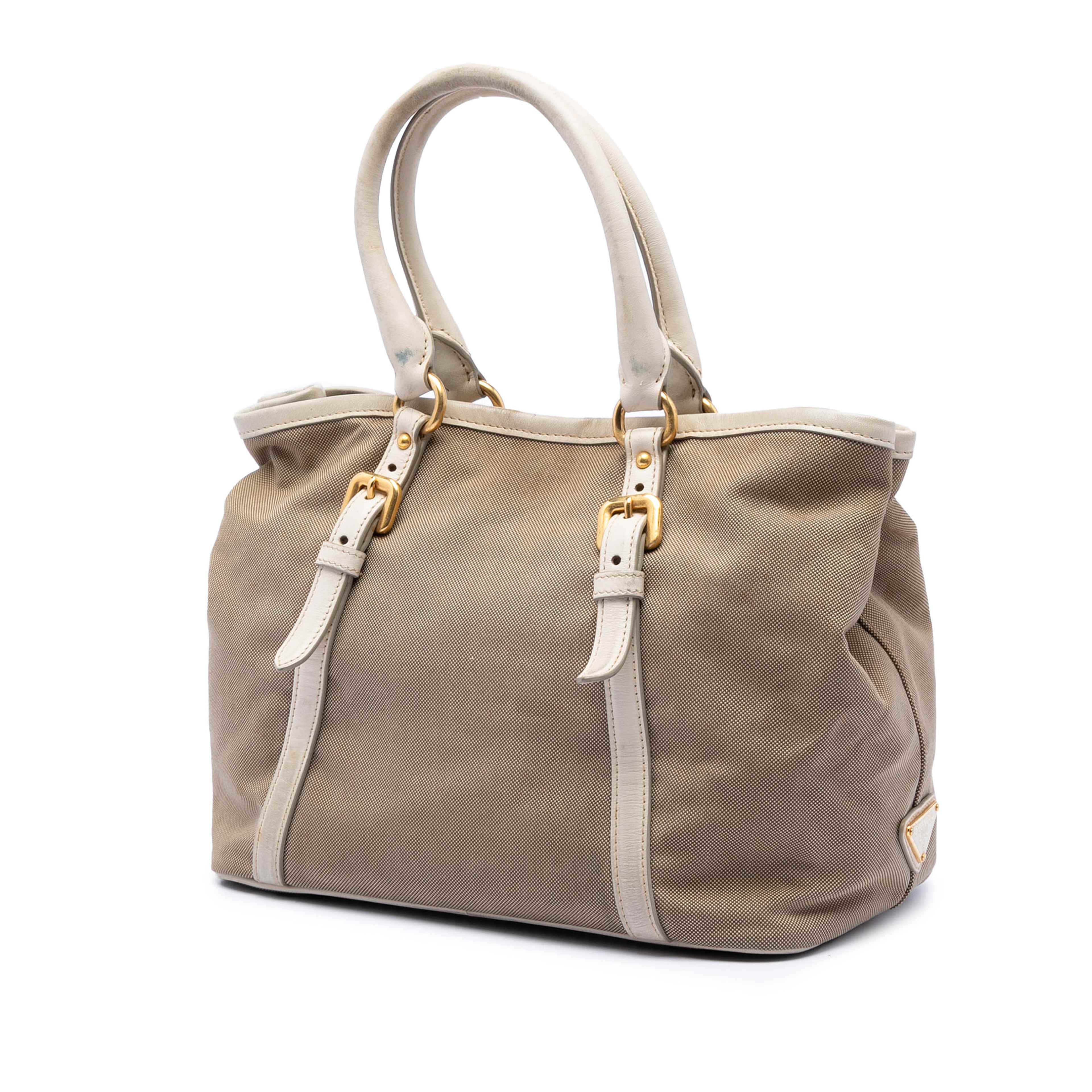 Prada Canvas Canapa Logo Bow Satchel, från Luxclusif, i färgen vit. Klicka för att öppna bilden i stort format