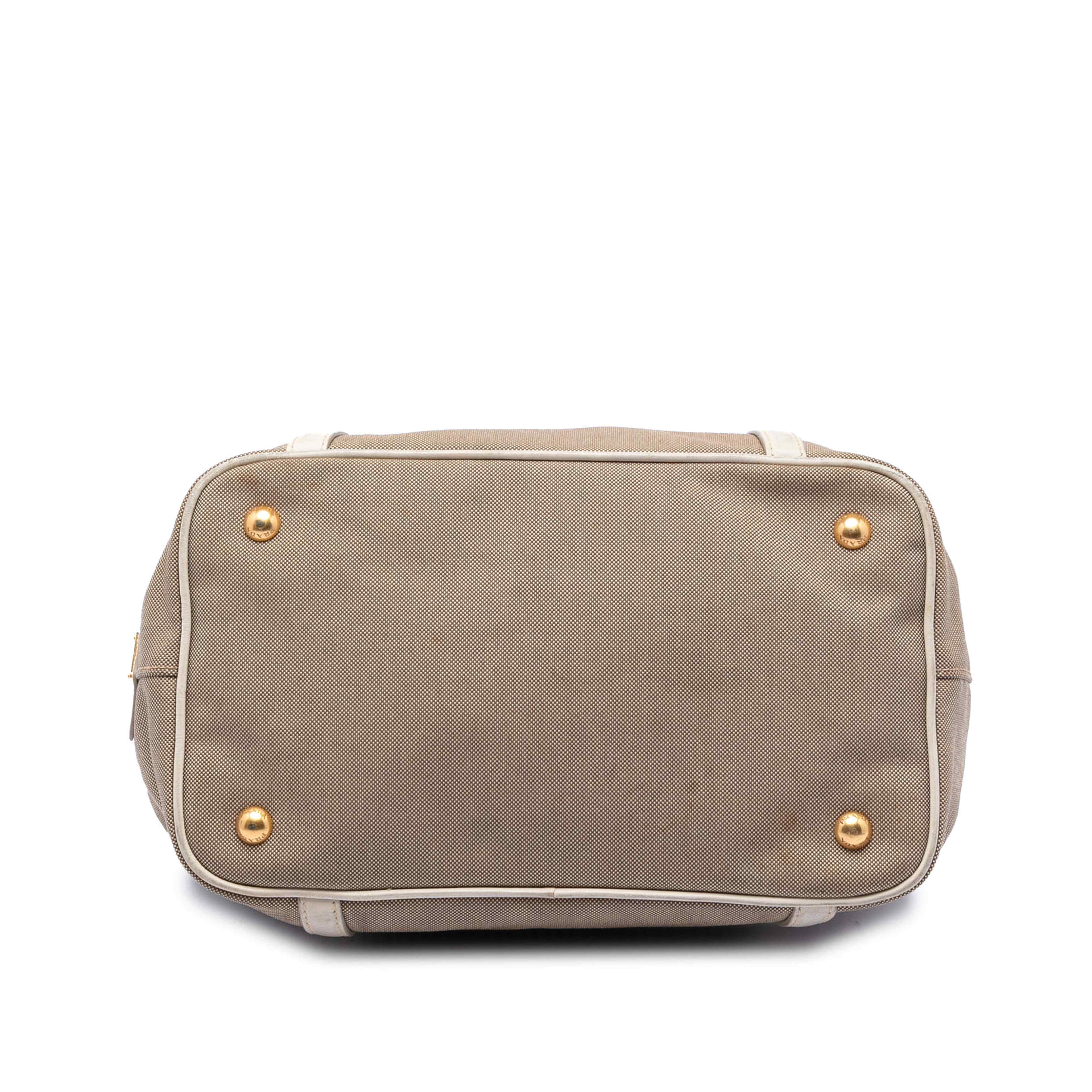 Prada Canvas Canapa Logo Bow Satchel, från Luxclusif, i färgen vit. Klicka för att öppna bilden i stort format