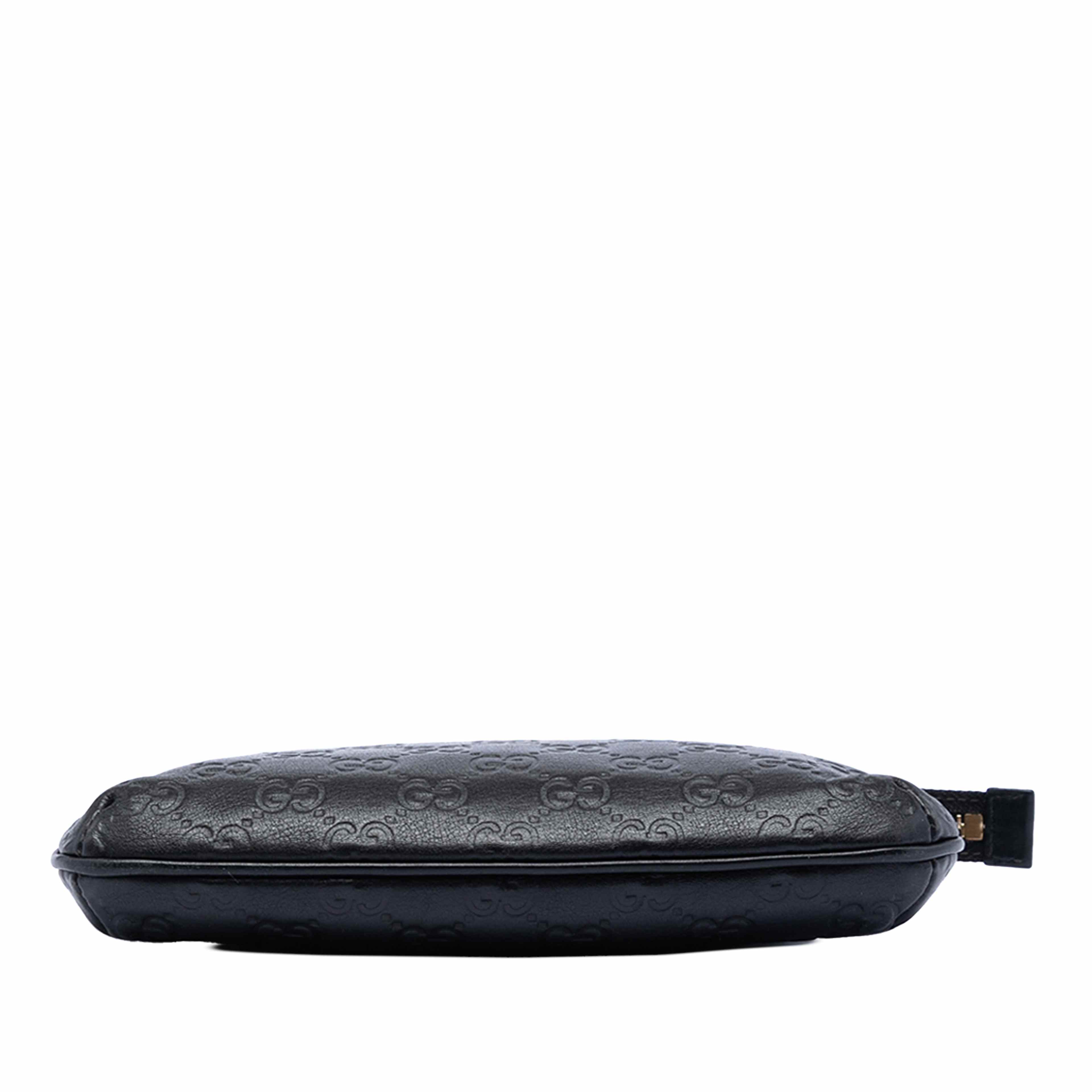 Gucci Guccissima New Britt Wristlet Pouch, från Luxclusif, i färgen black. Klicka för att öppna bilden i stort format