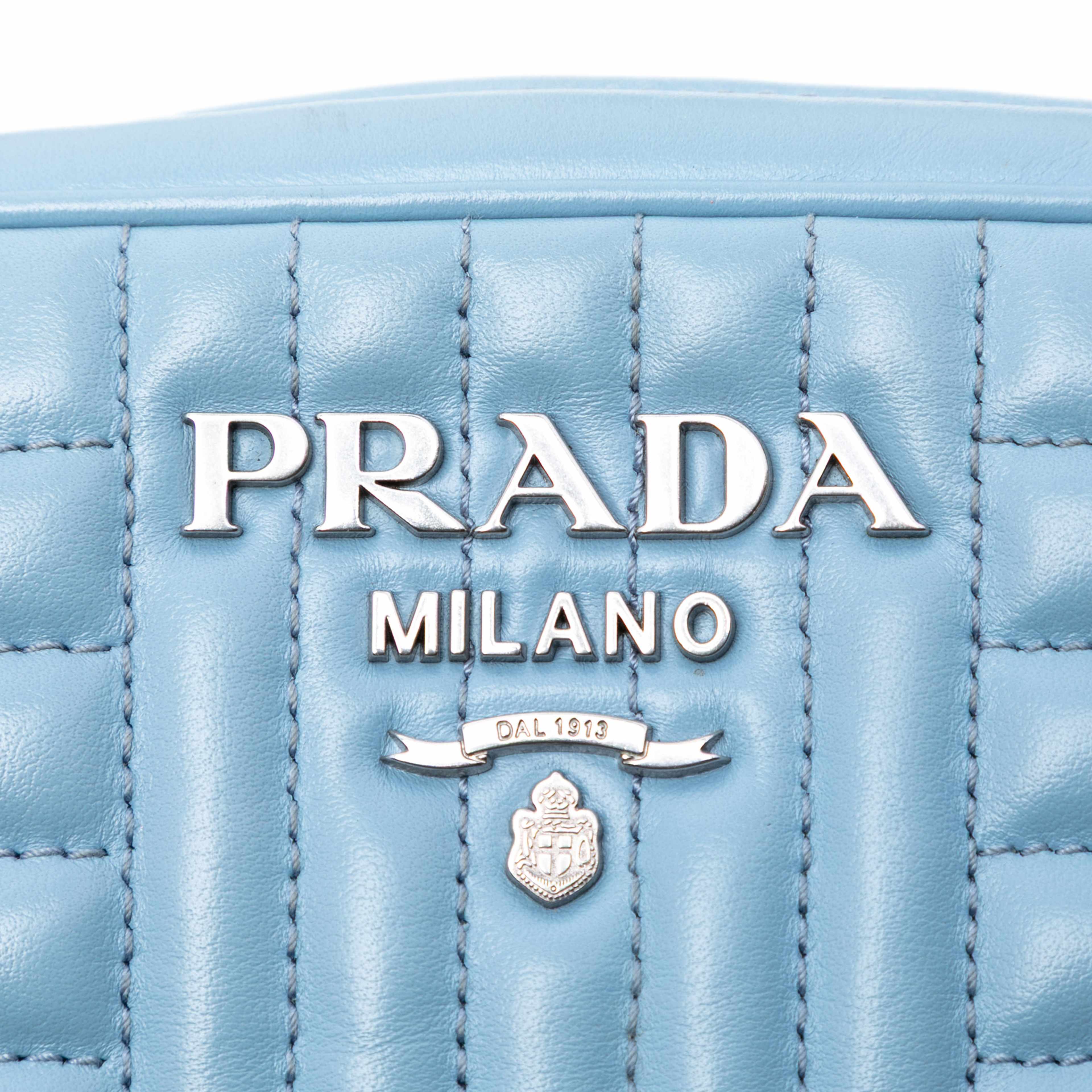 Prada Soft Calfskin Diagramme Camera Bag, från Luxclusif, i färgen light blue. Klicka för att öppna bilden i stort format