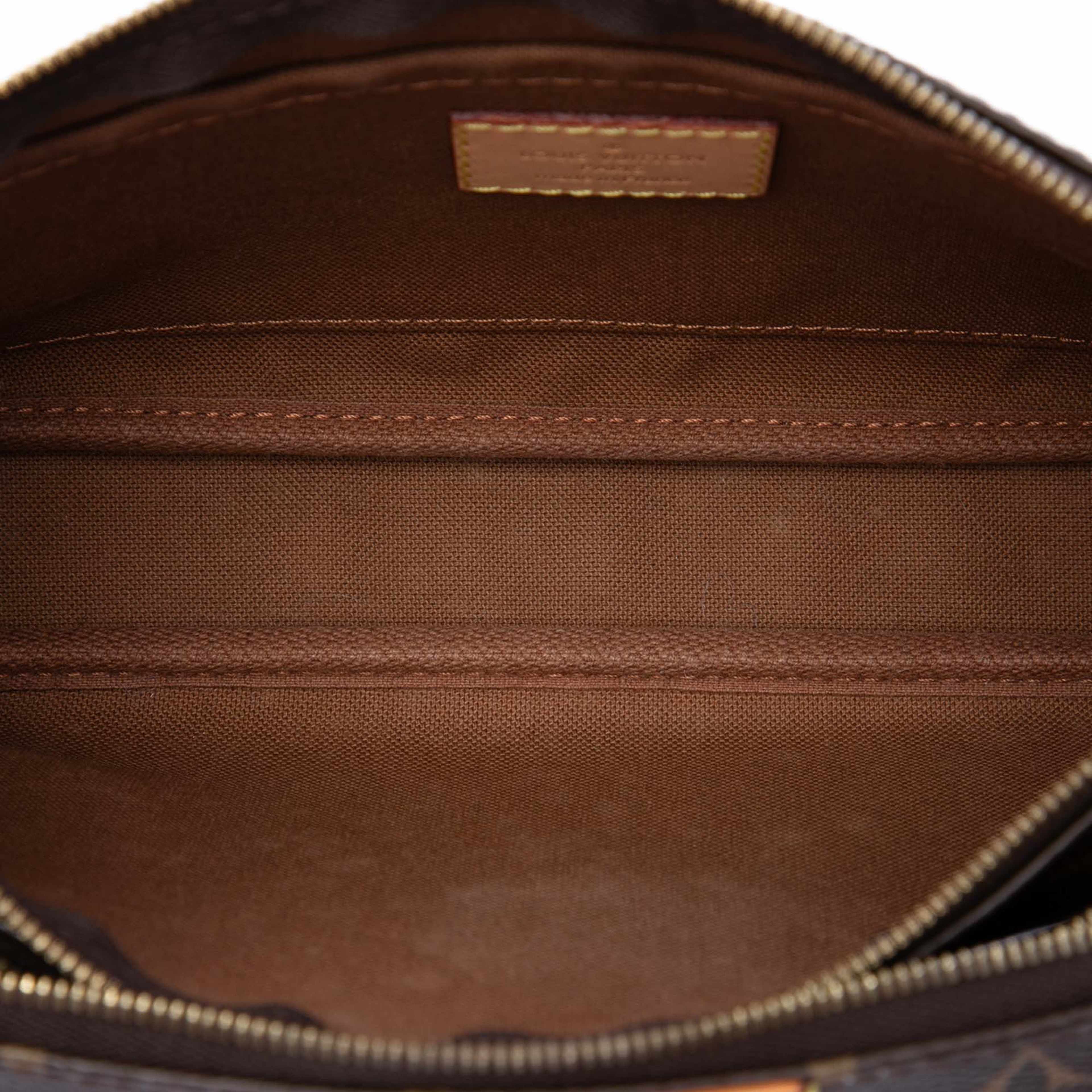 Louis Vuitton Monogram Multi Pochette Accessoires, från Luxclusif, i färgen brun. Klicka för att öppna bilden i stort format