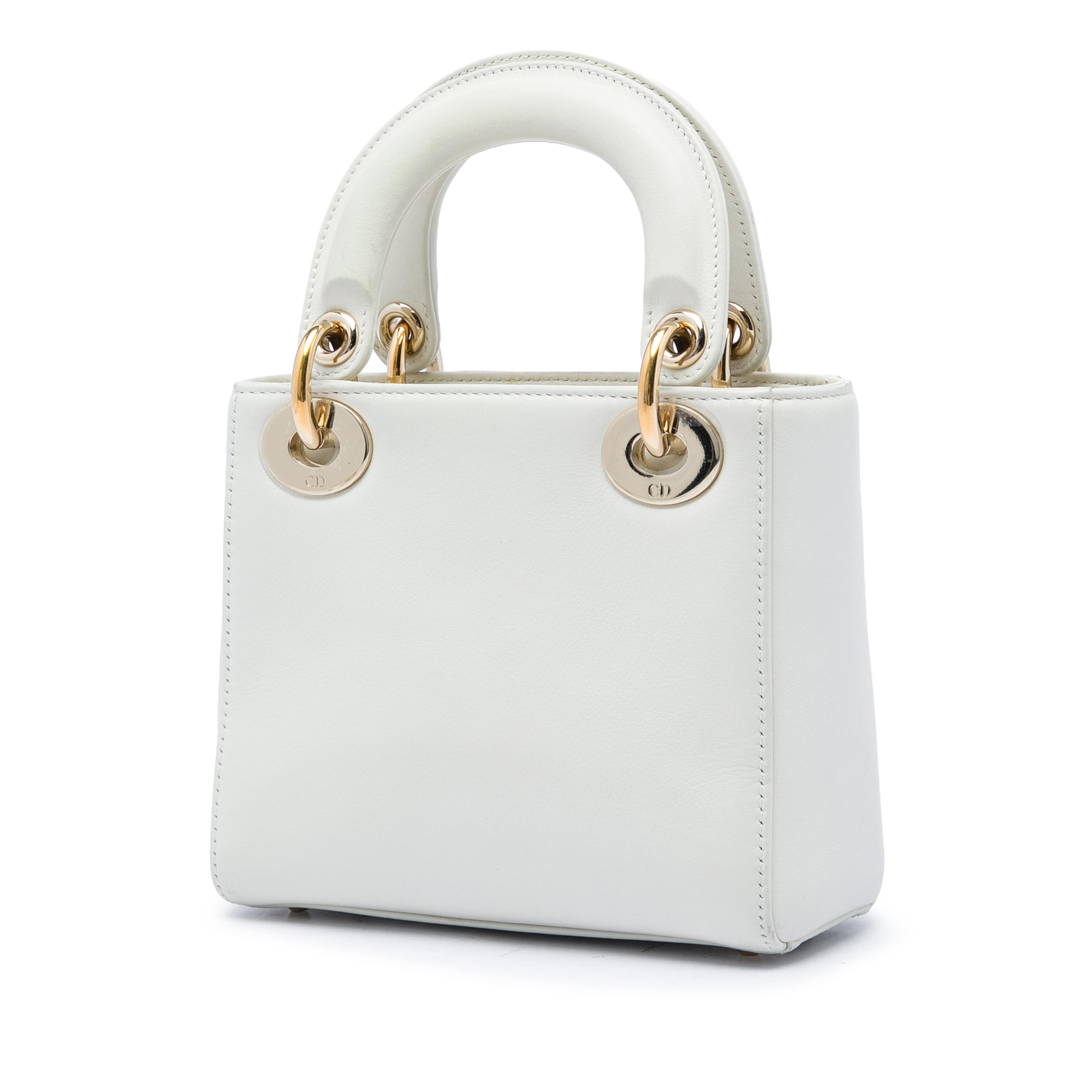 Dior Dioramour Niki De Saint Phalle Mini Calfskin Lady Dior, från Luxclusif, i färgen vit. Klicka för att öppna bilden i stort format