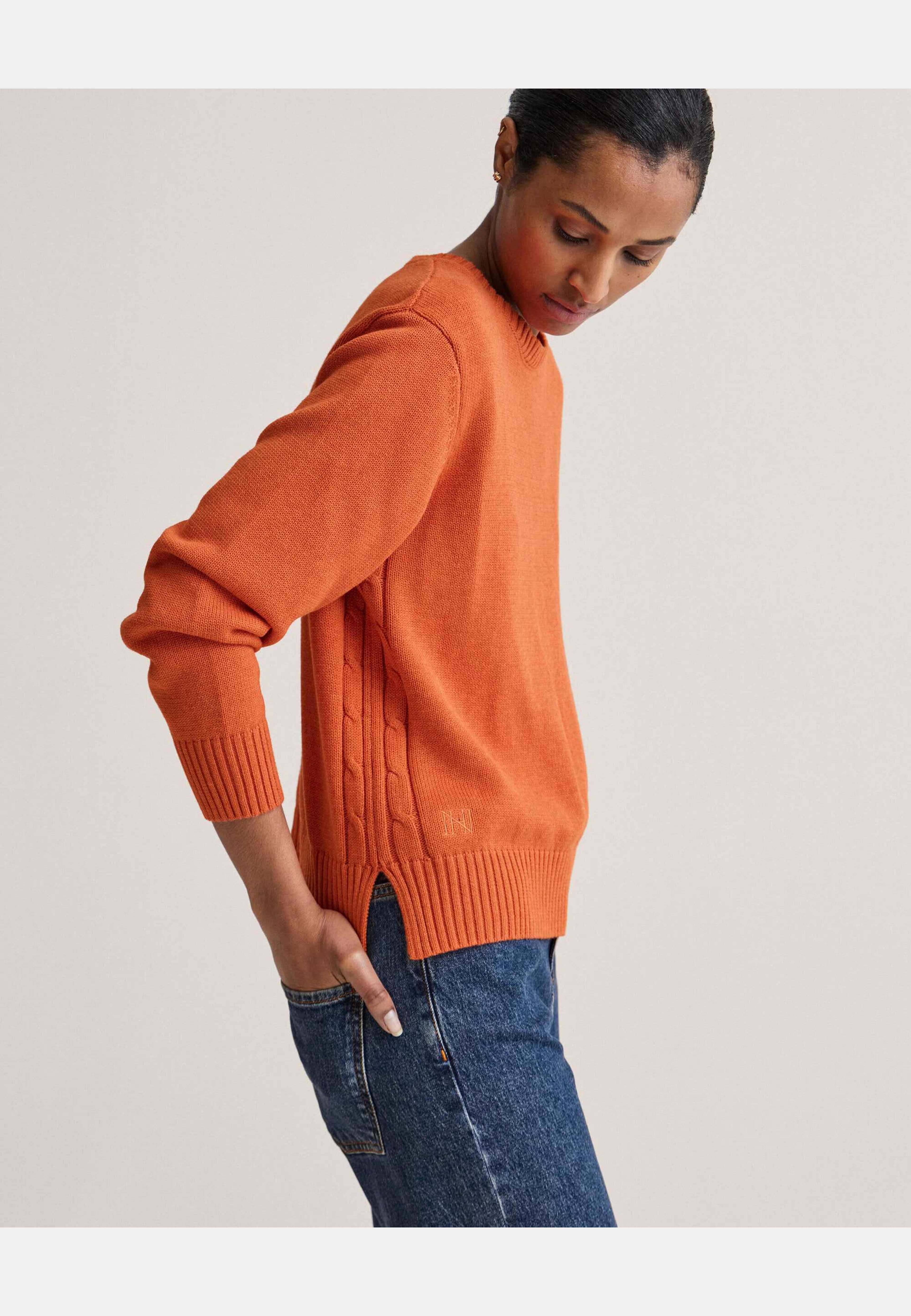 Roe Sweater, från Newhouse, i färgen orange. Klicka för att öppna bilden i stort format