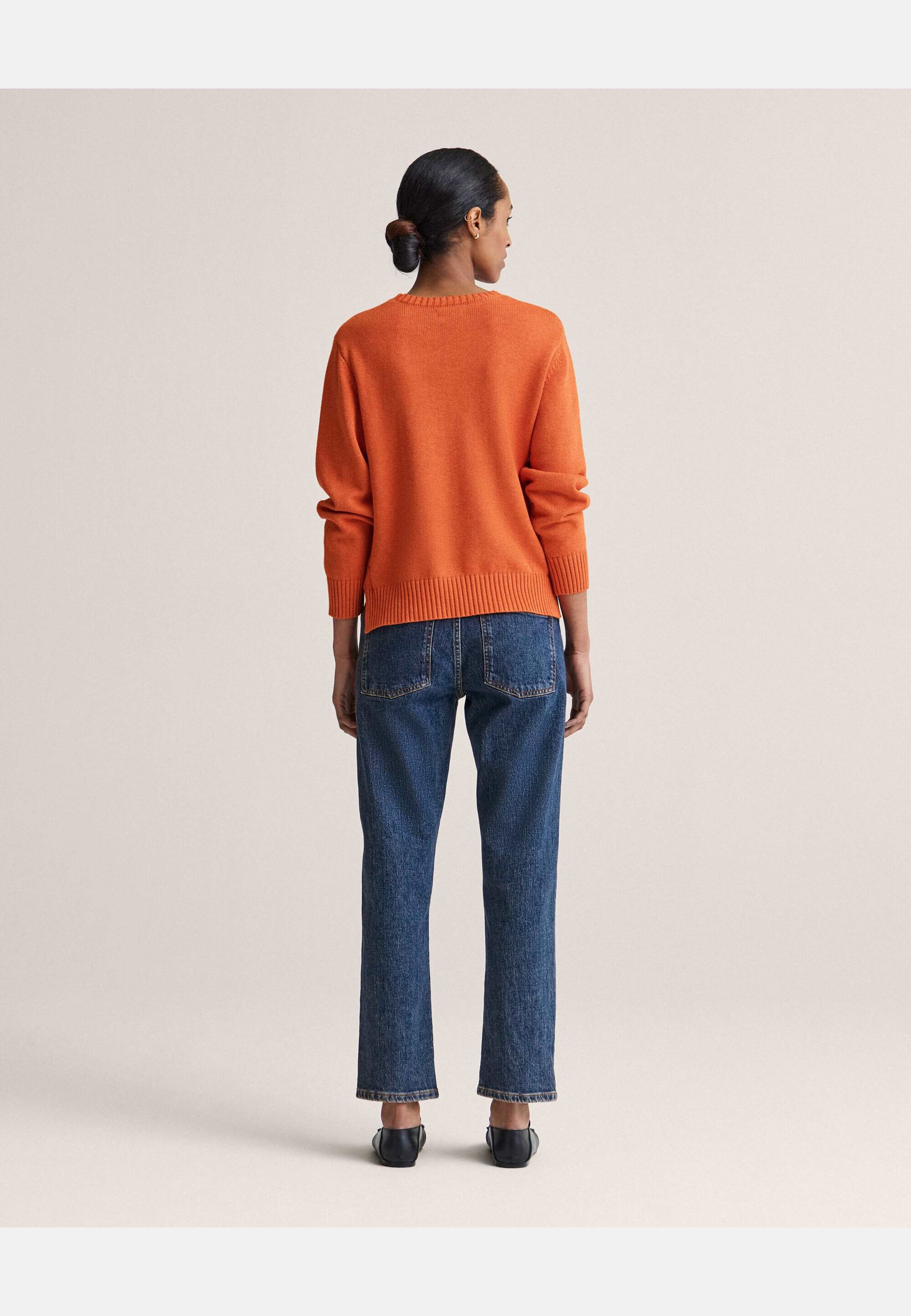 Roe Sweater, från Newhouse, i färgen orange. Klicka för att öppna bilden i stort format