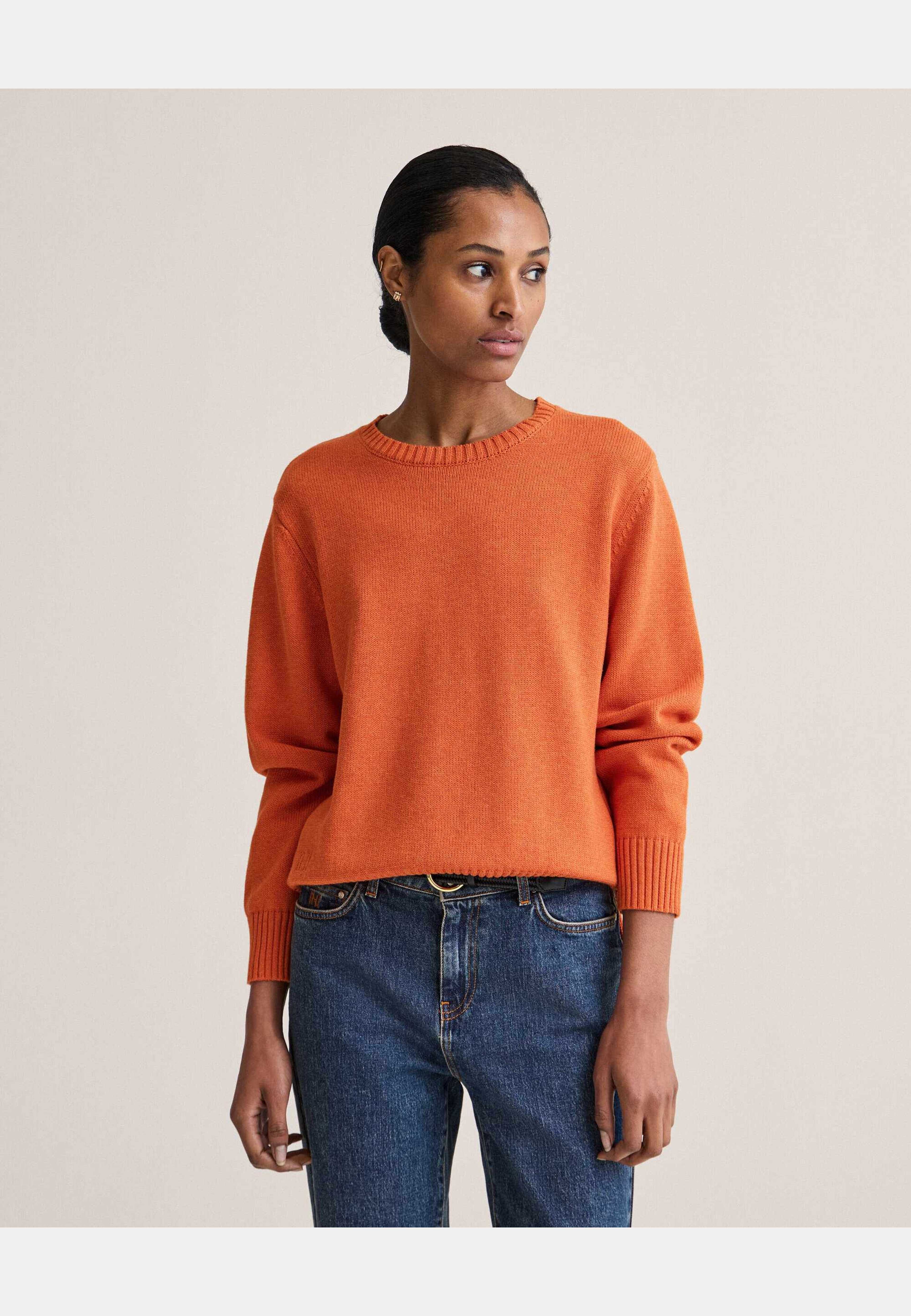Roe Sweater, från Newhouse, i färgen orange. Klicka för att öppna bilden i stort format