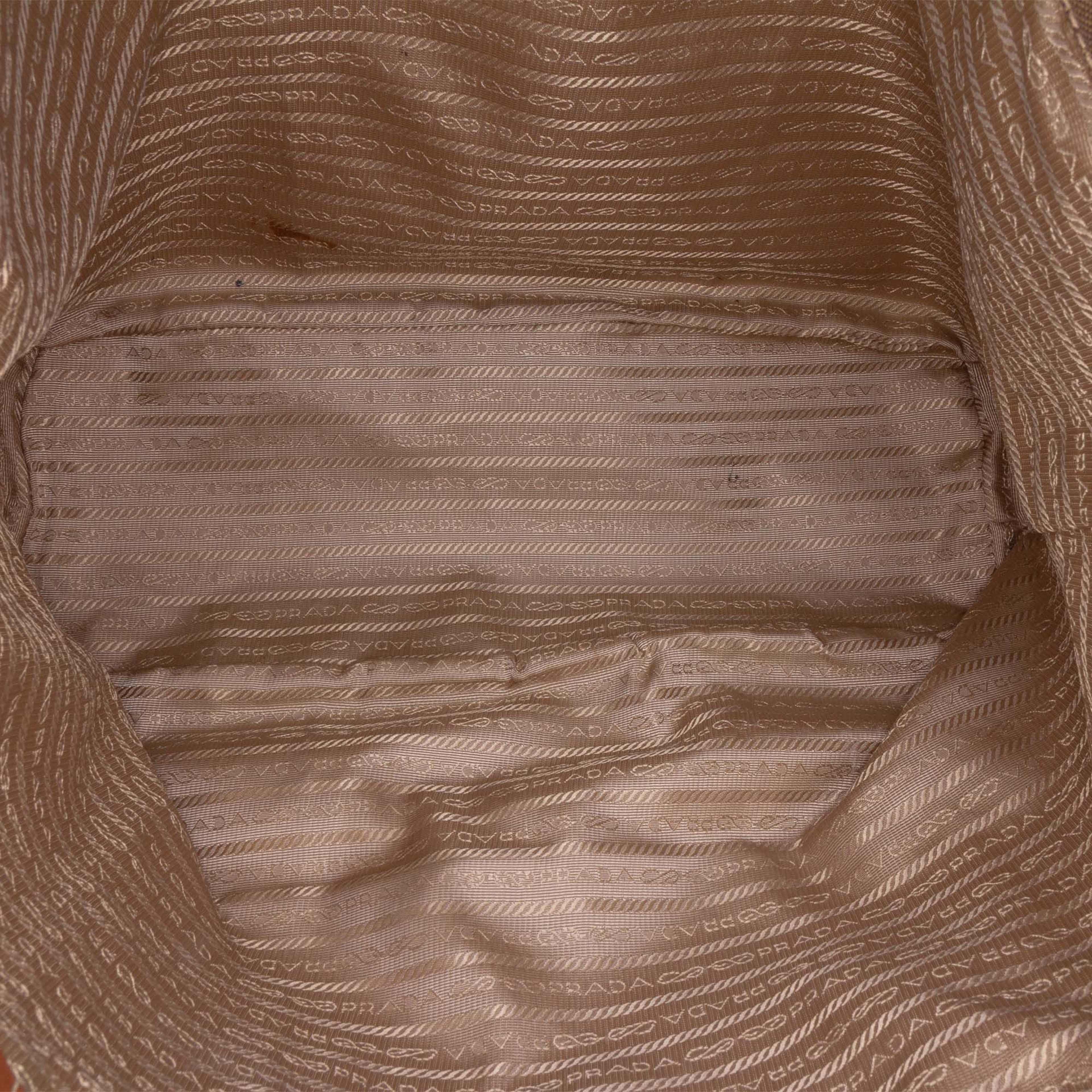 Prada Canvas Canapa Logo Tote, från Luxclusif, i färgen brown. Klicka för att öppna bilden i stort format