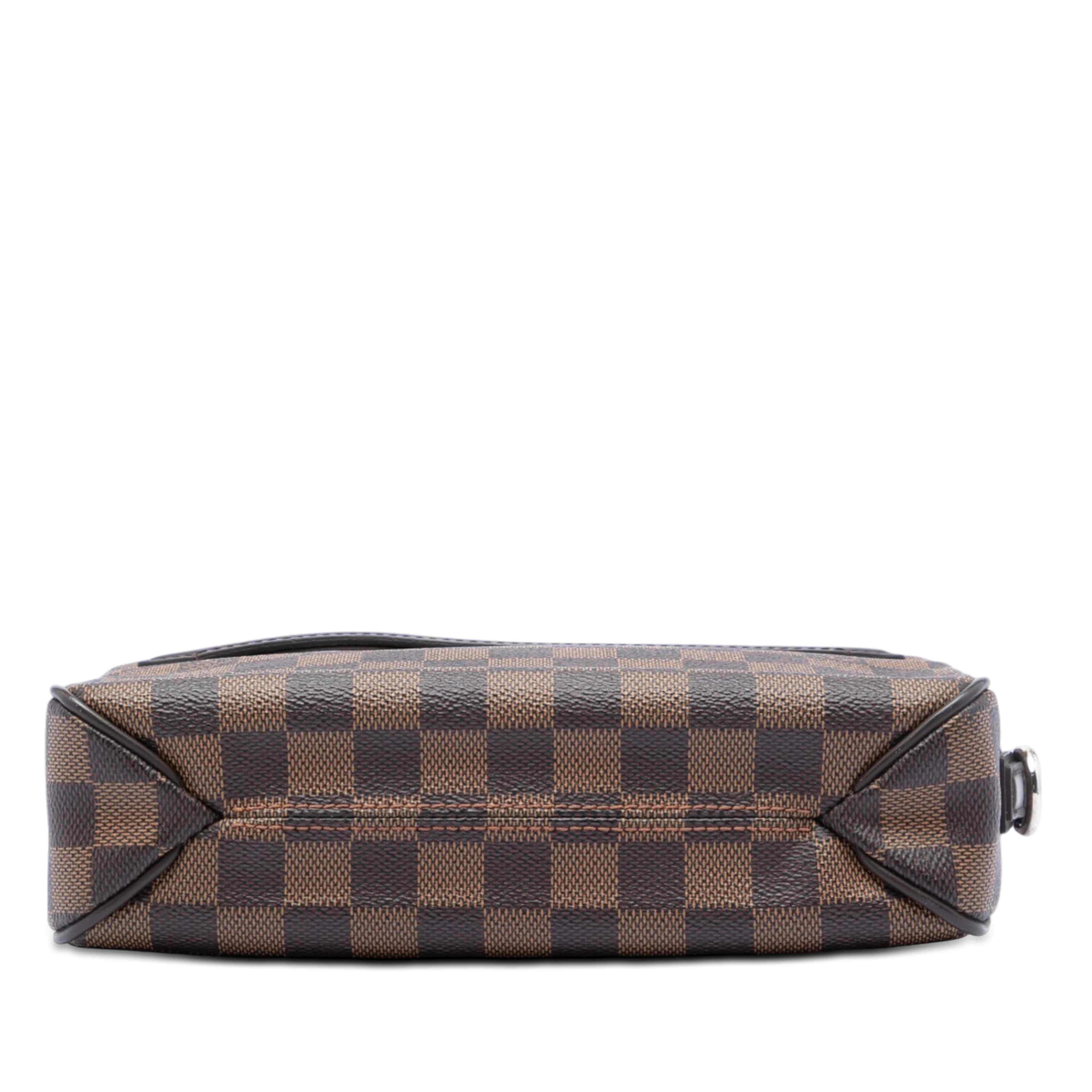 Louis Vuitton Damier Ebene Pochette Saint Paul, från Luxclusif, i färgen brun. Klicka för att öppna bilden i stort format