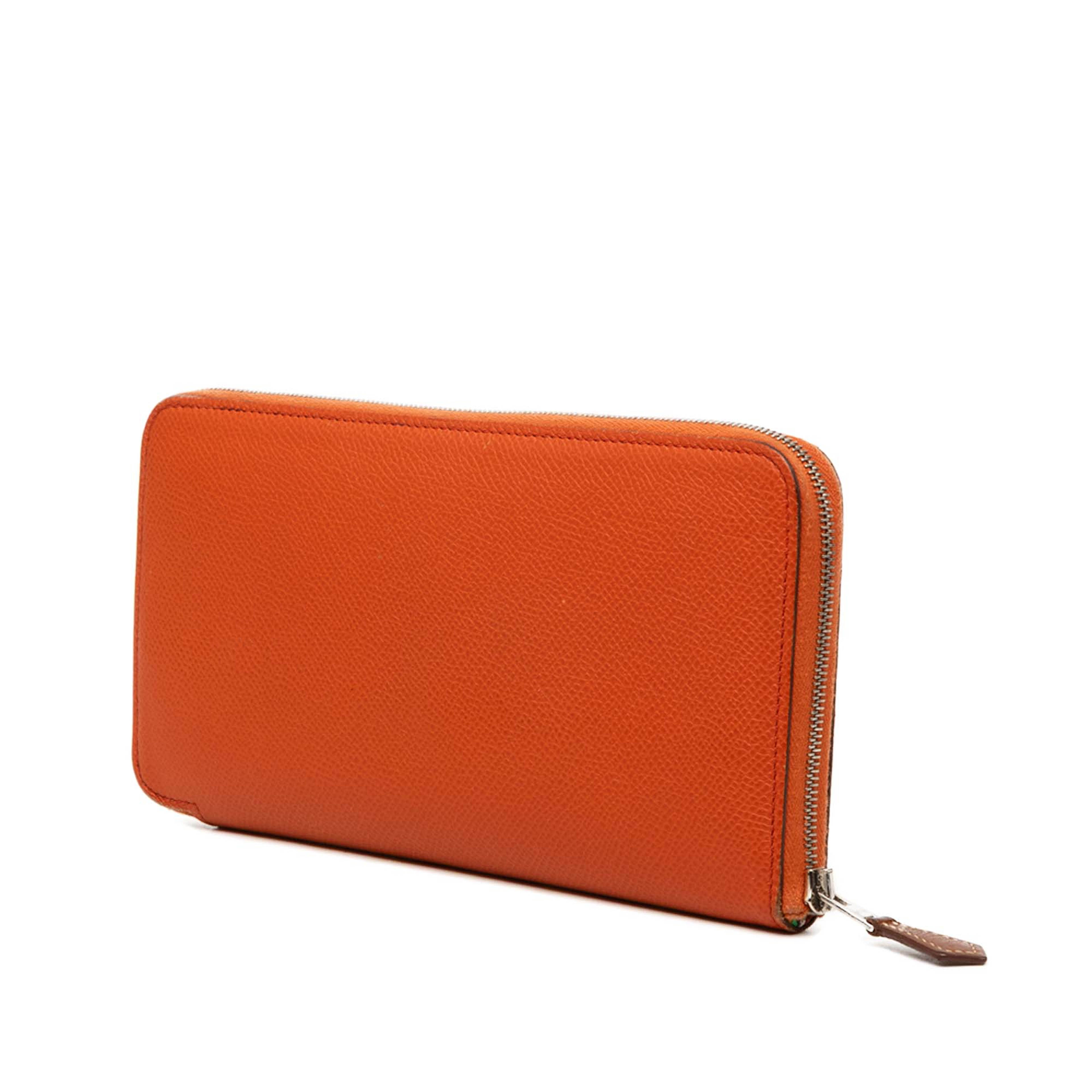 Hermès Epsom Silk In Classique Long Wallet, från Luxclusif, i färgen dark orange. Klicka för att öppna bilden i stort format
