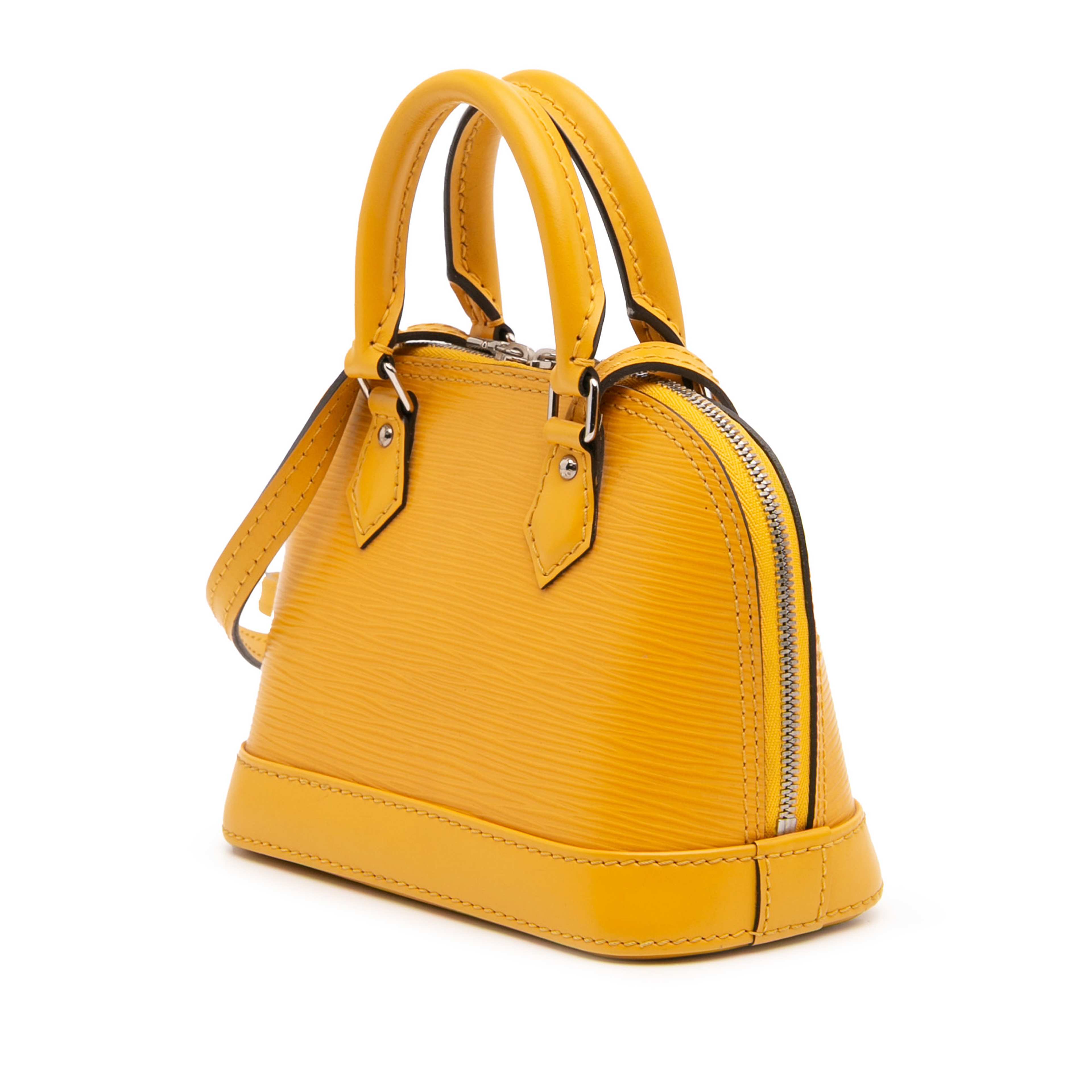 Louis Vuitton Epi Nano Alma, från Luxclusif, i färgen yellow. Klicka för att öppna bilden i stort format