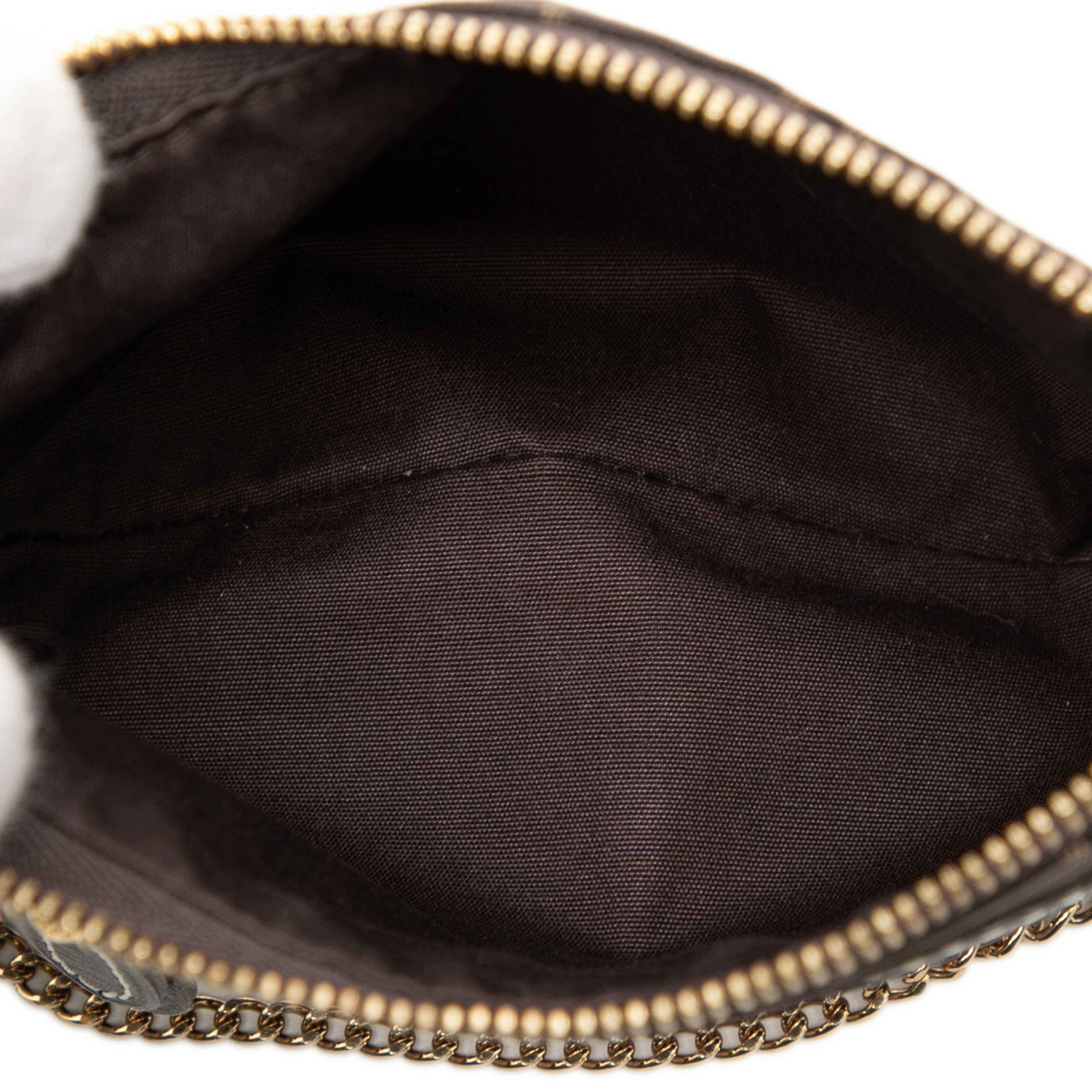 Louis Vuitton Monogram Idylle Mini Pochette Accessoires, från Luxclusif, i färgen dark brown. Klicka för att öppna bilden i stort format