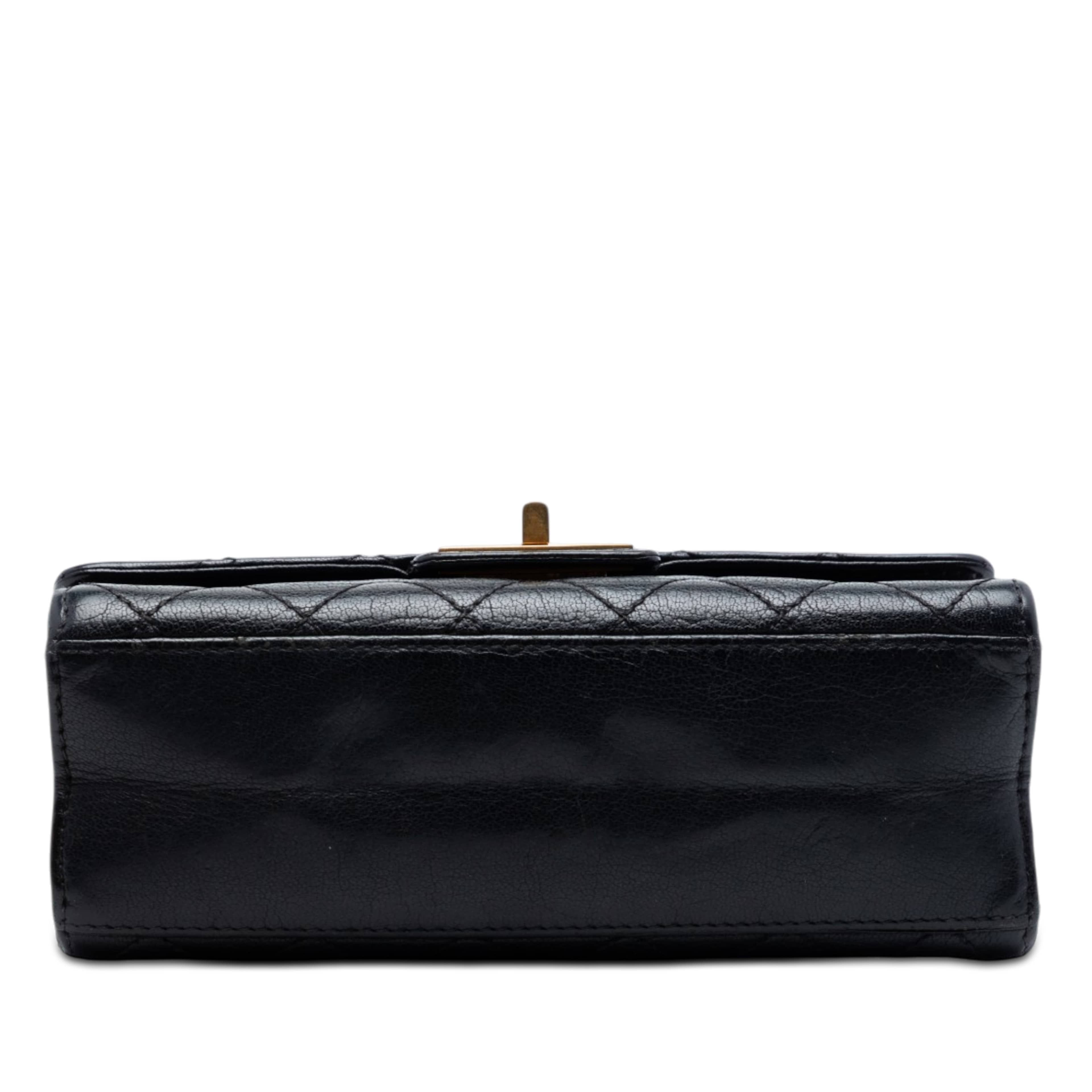 Chanel Mini Quilted Goatskin Reissue 2.55 Rita Flap, från Luxclusif, i färgen svart. Klicka för att öppna bilden i stort format