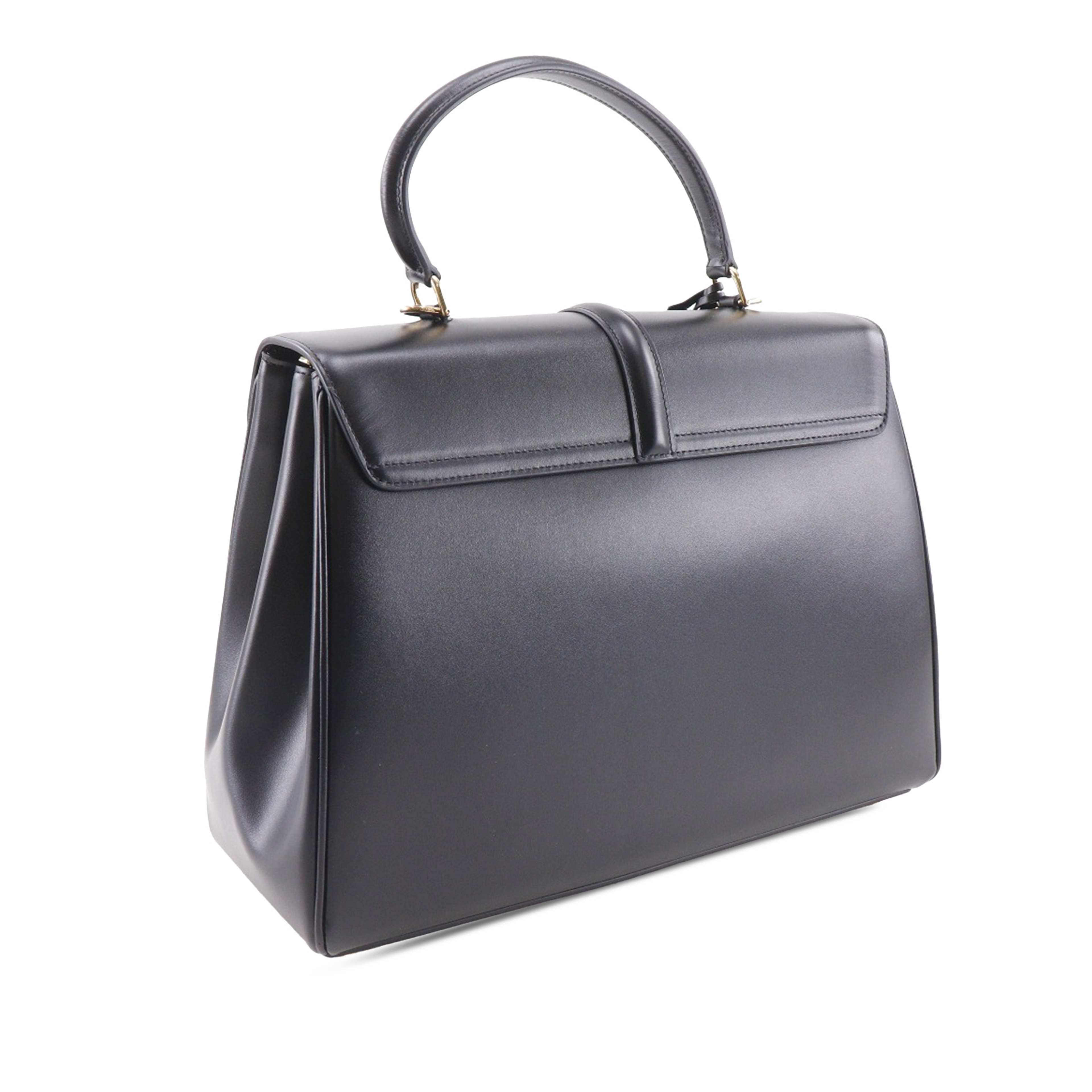 Celine Medium Calfskin Classique 16 Top Handle Bag, från Luxclusif, i färgen svart. Klicka för att öppna bilden i stort format