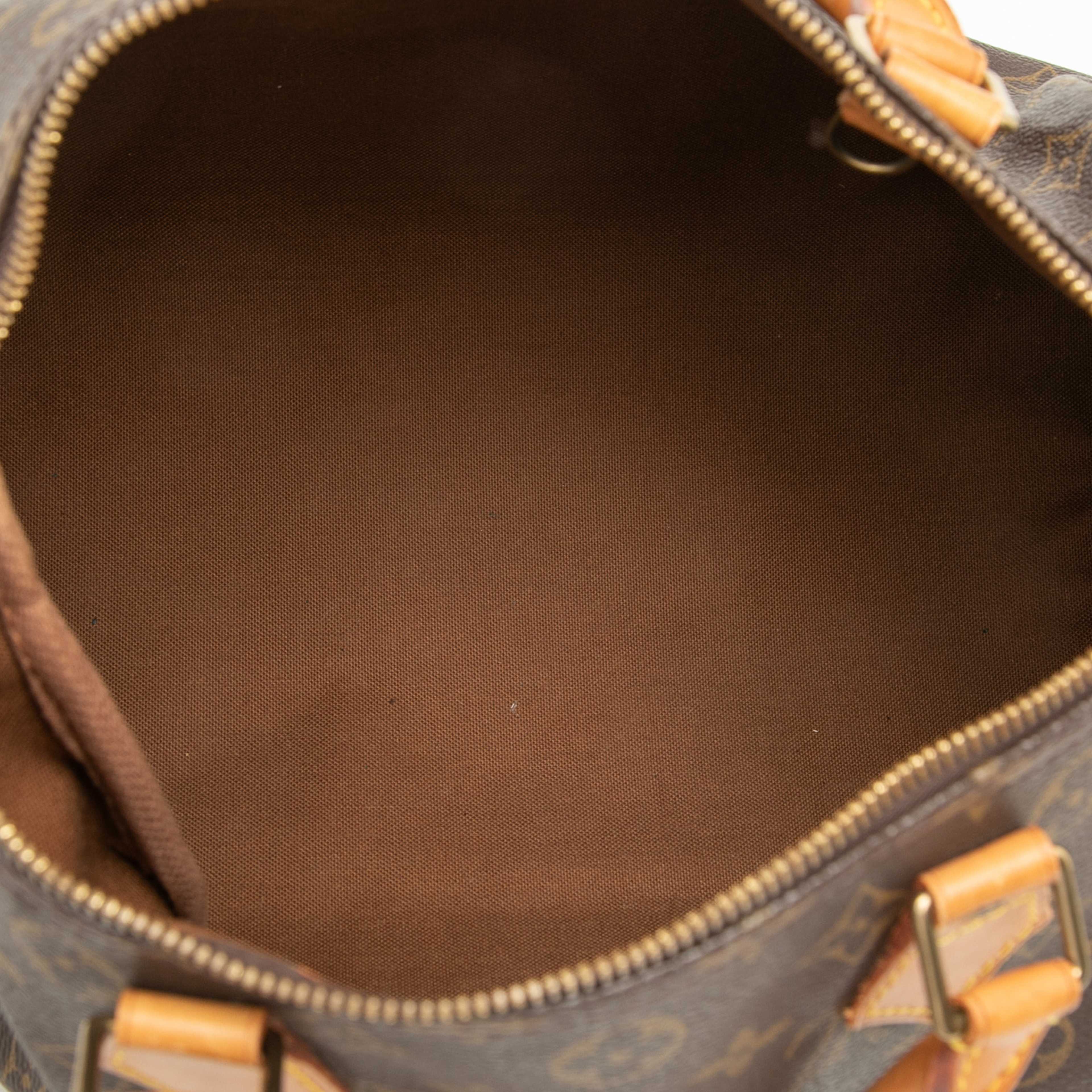 Louis Vuitton Monogram Speedy 30, från Luxclusif, i färgen brun. Klicka för att öppna bilden i stort format