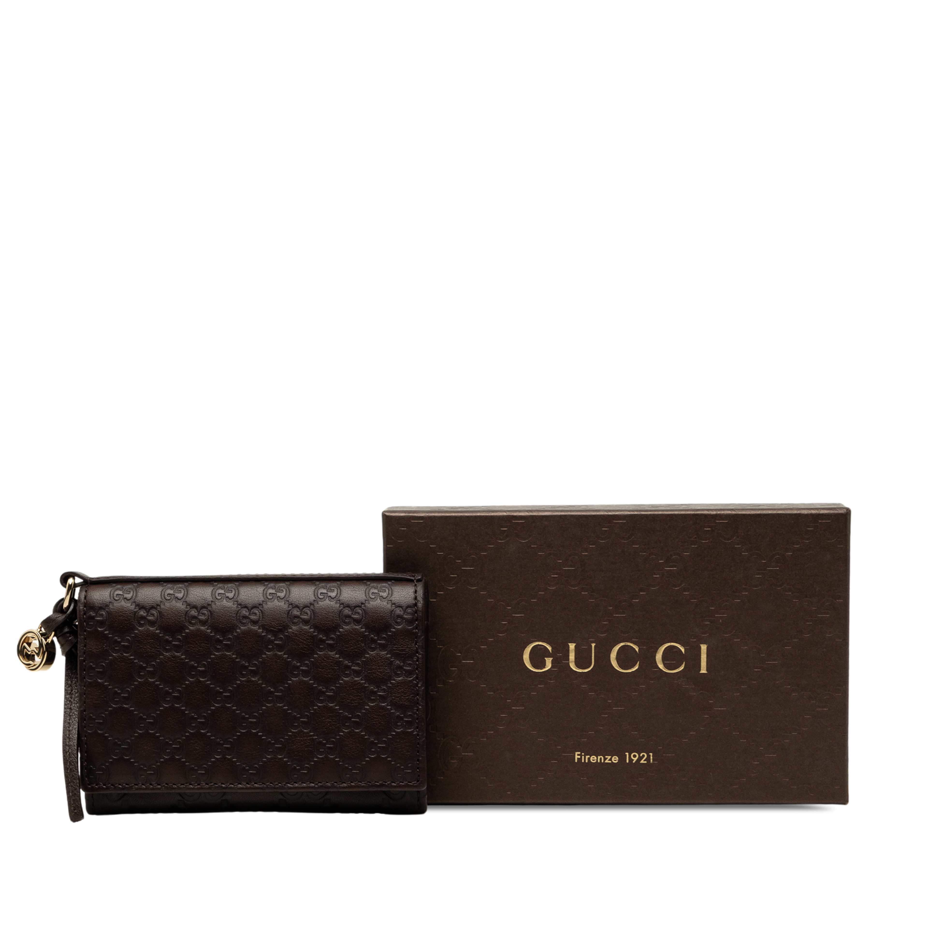 Gucci Guccissima Flap Card Case, från Luxclusif, i färgen brun. Klicka för att öppna bilden i stort format