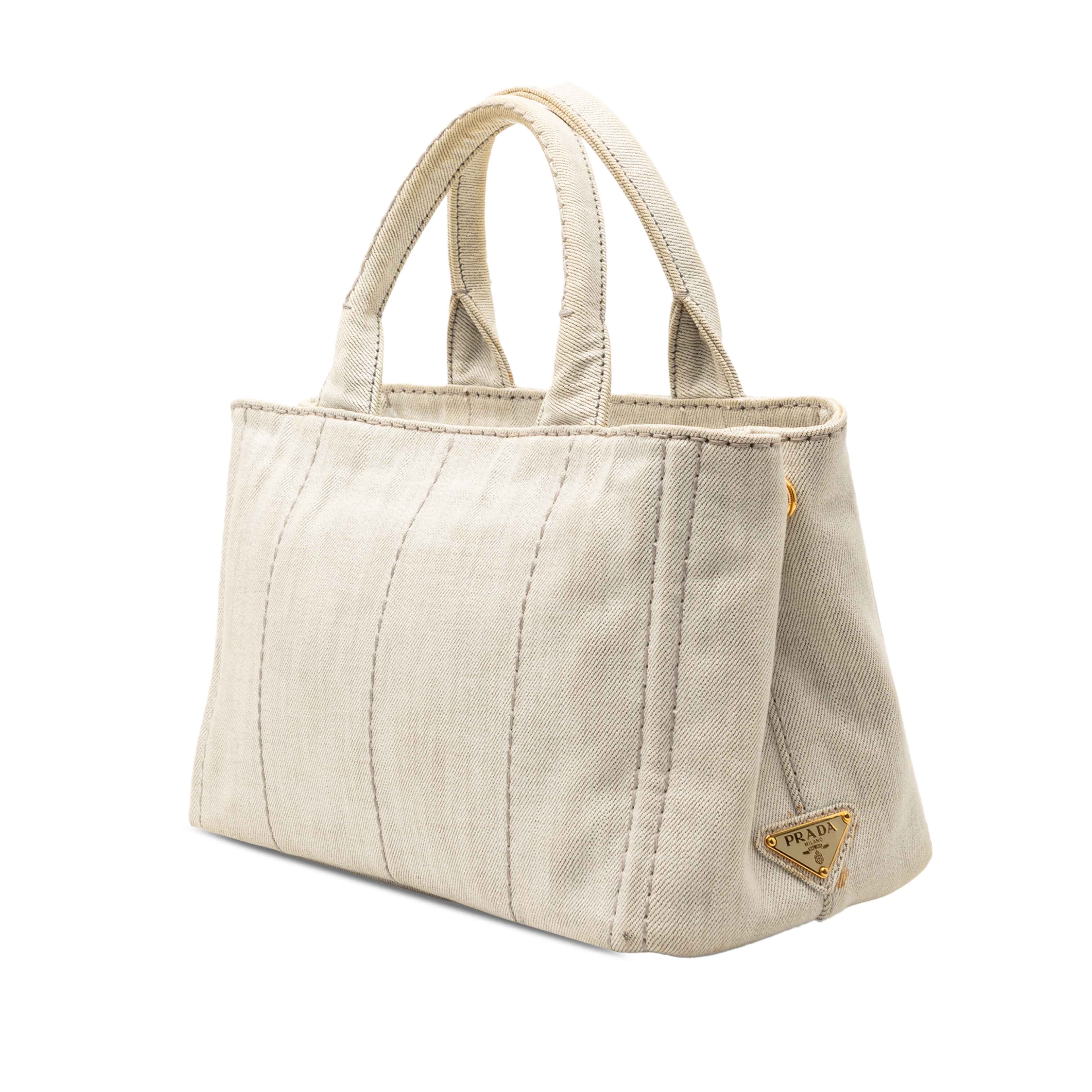 Prada Small Denim Canapa Logo Satchel, från Luxclusif, i färgen light gray. Klicka för att öppna bilden i stort format