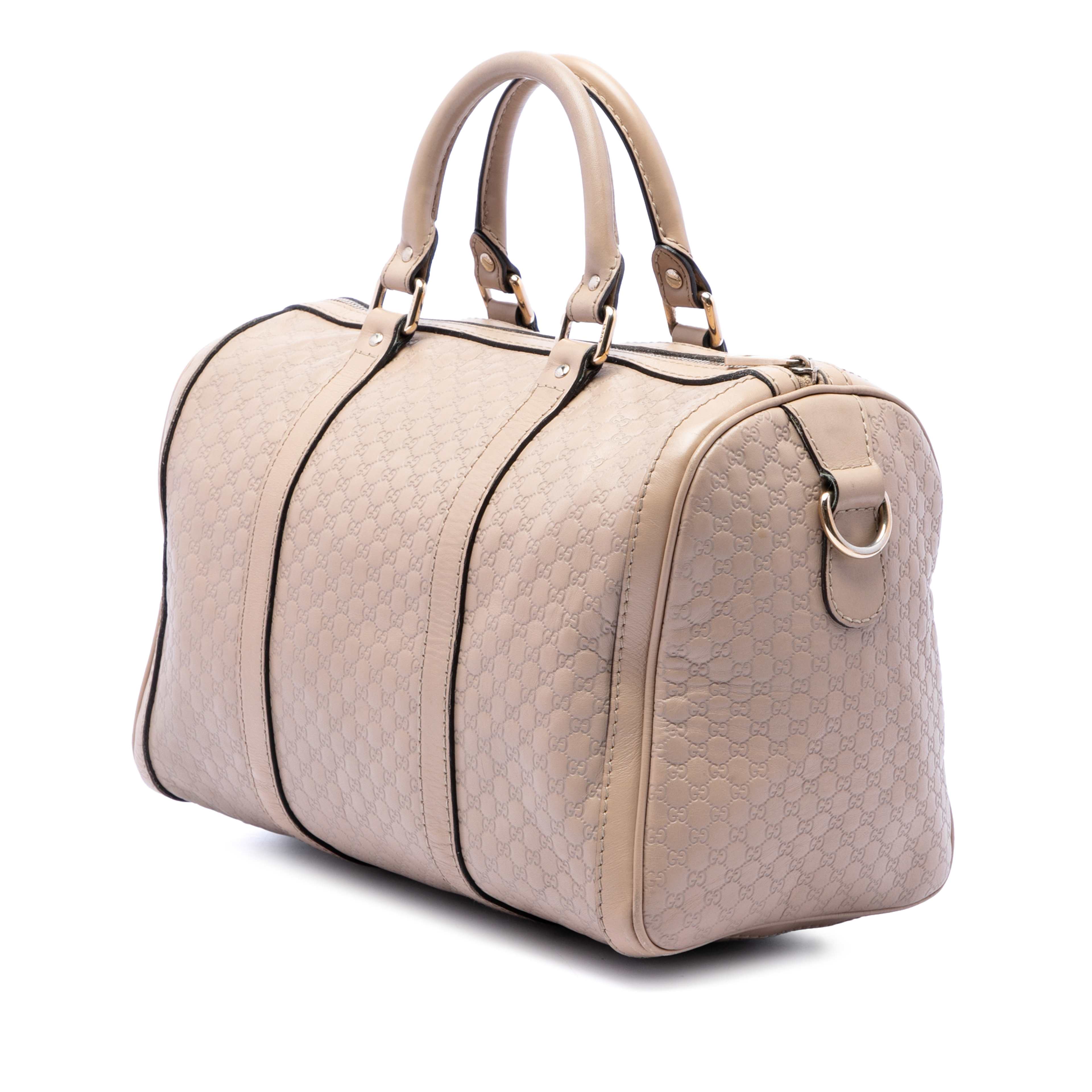 Gucci Medium Microguccissima Joy Boston Bag, från Luxclusif, i färgen brun. Klicka för att öppna bilden i stort format